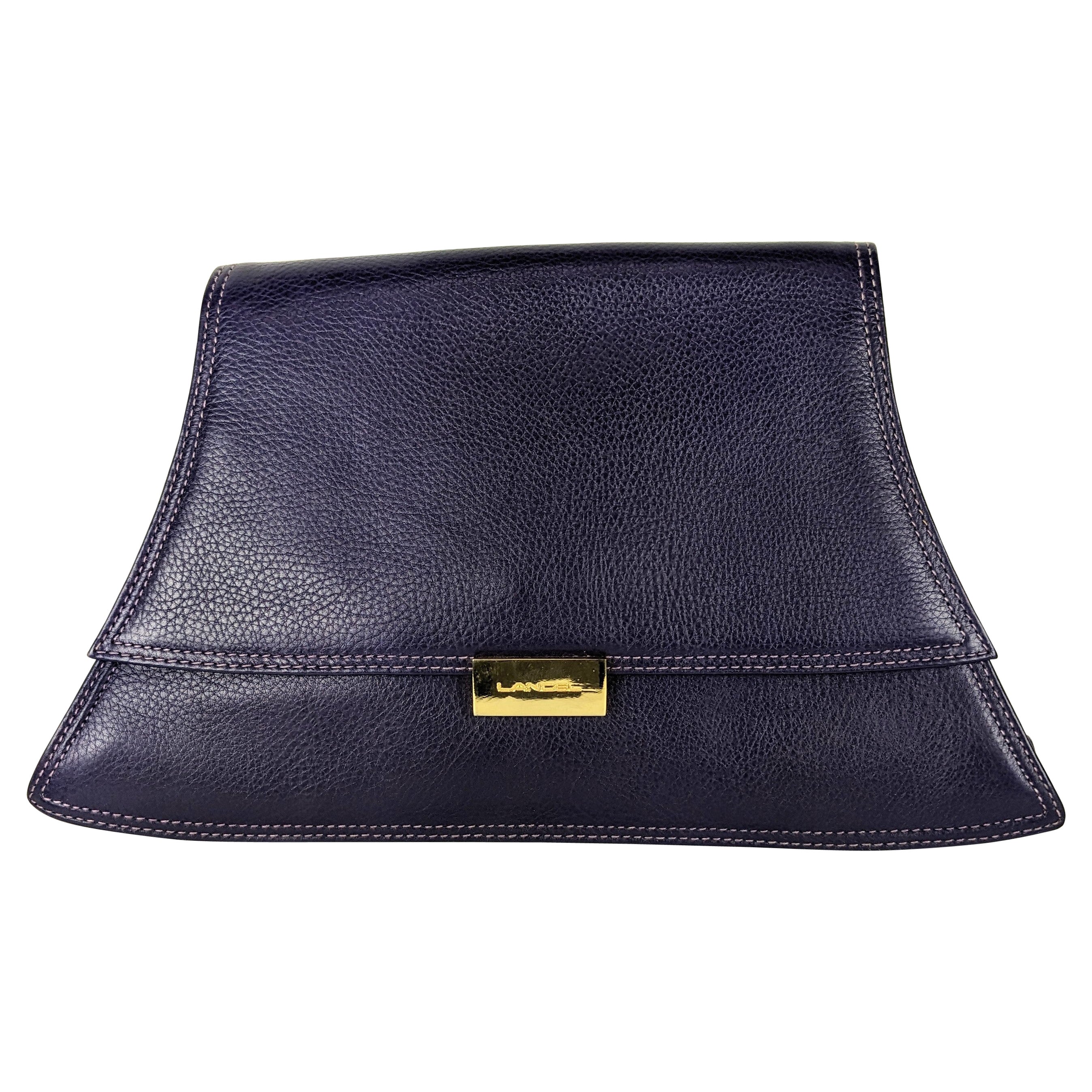Lancel Lila Clutch in Form einer Lila