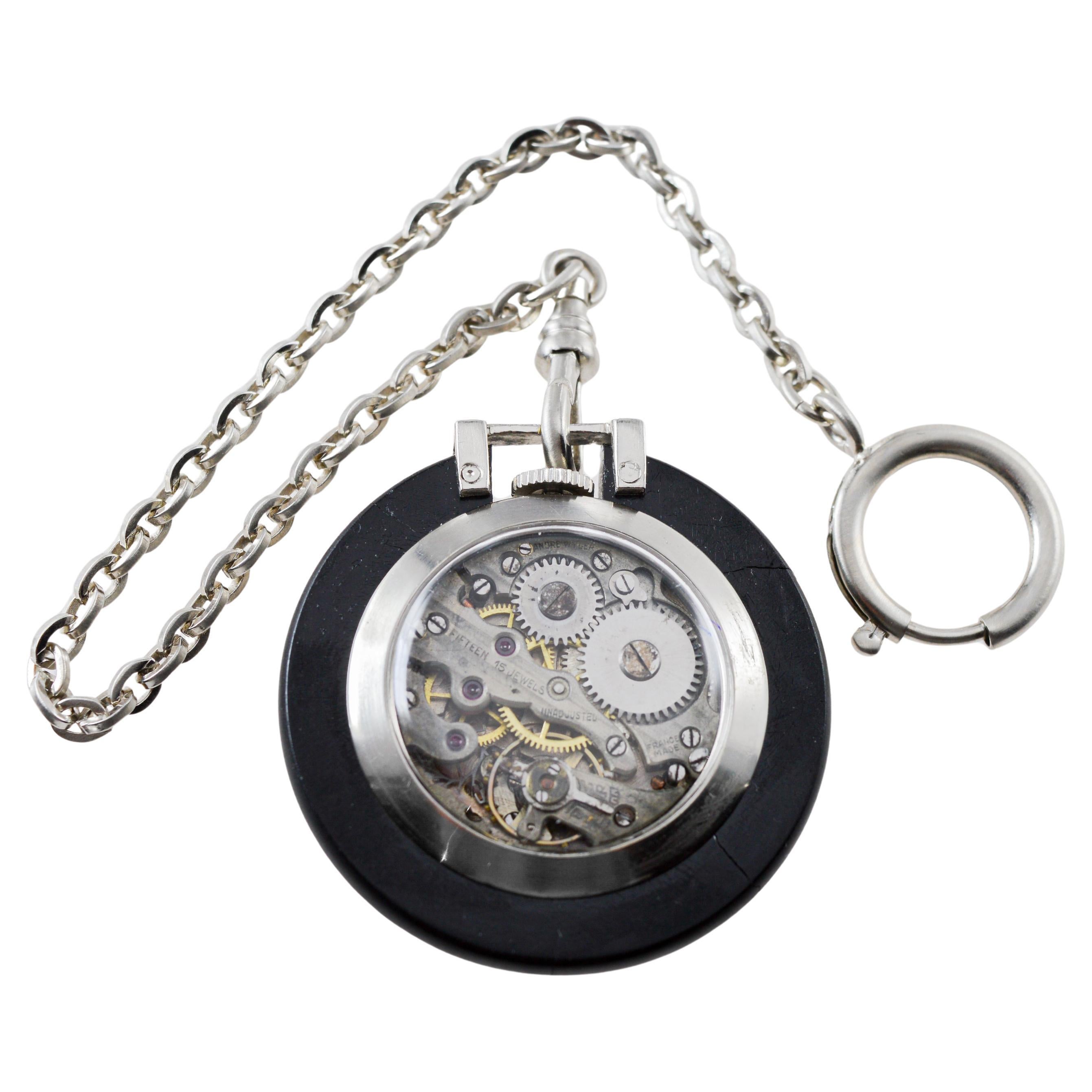 FACTORY / HOUSE: Lancet, Famous French House
STYLE / REFERENCE: Art Deco 
METAL / MATERIAL: Nickel and Rubber
CIRCA / YEAR: 1920's
DIMENSIONS / SIZE: Length 36mm X Diameter 31mm
MOVEMENT / CALIBER: Manual Winding / Jewels / Caliber 
DIAL / HANDS: