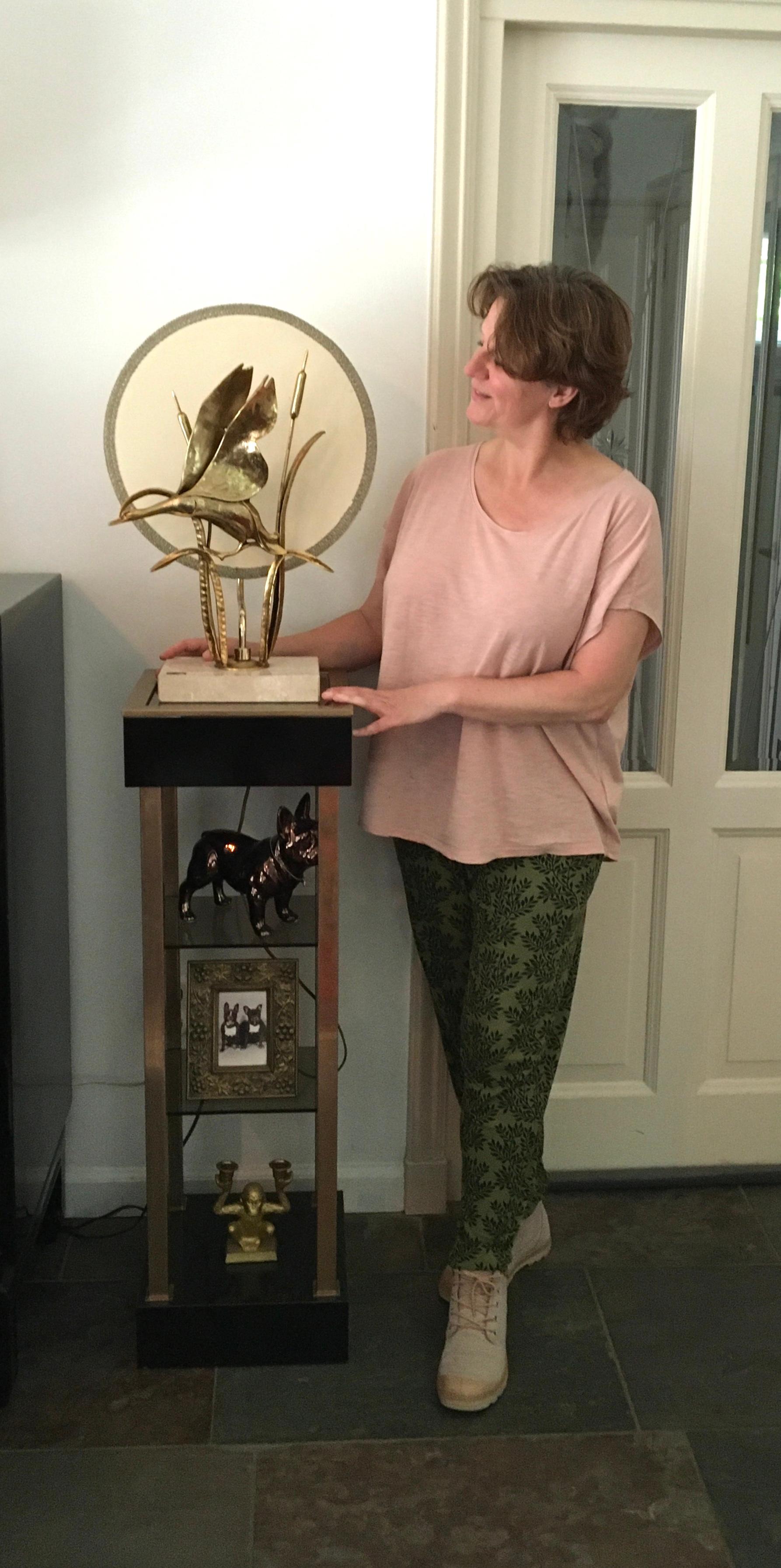 Lancia table lamp with flying birds in the sunset. 
Signed at the back of a wing and also a label at the travertin.
Italian table lamp with a travertin base and brass flying ducks or goose in the sunset or wild ducks flying in front of the moon.