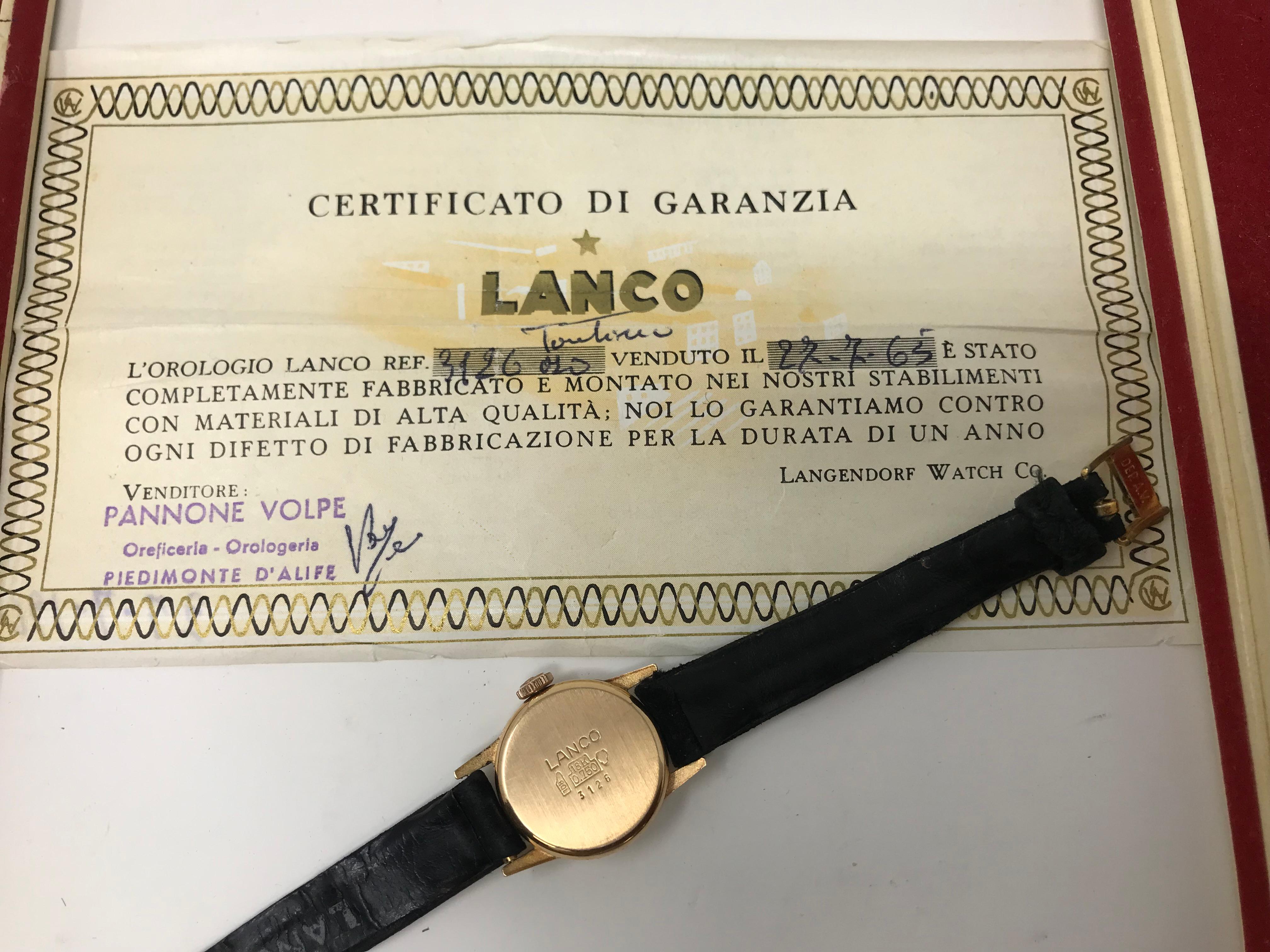 Lanco 18k Massivgold Damenuhr, Handaufzug, mit original schwarzem Armband ( gebraucht ), Box und  Garantie, hergestellt in der Schweiz um 1965. Case misst etwa 21mm und 23mm mit Krone, mechanisches Uhrwerk, gut funktionierende Ordnung.