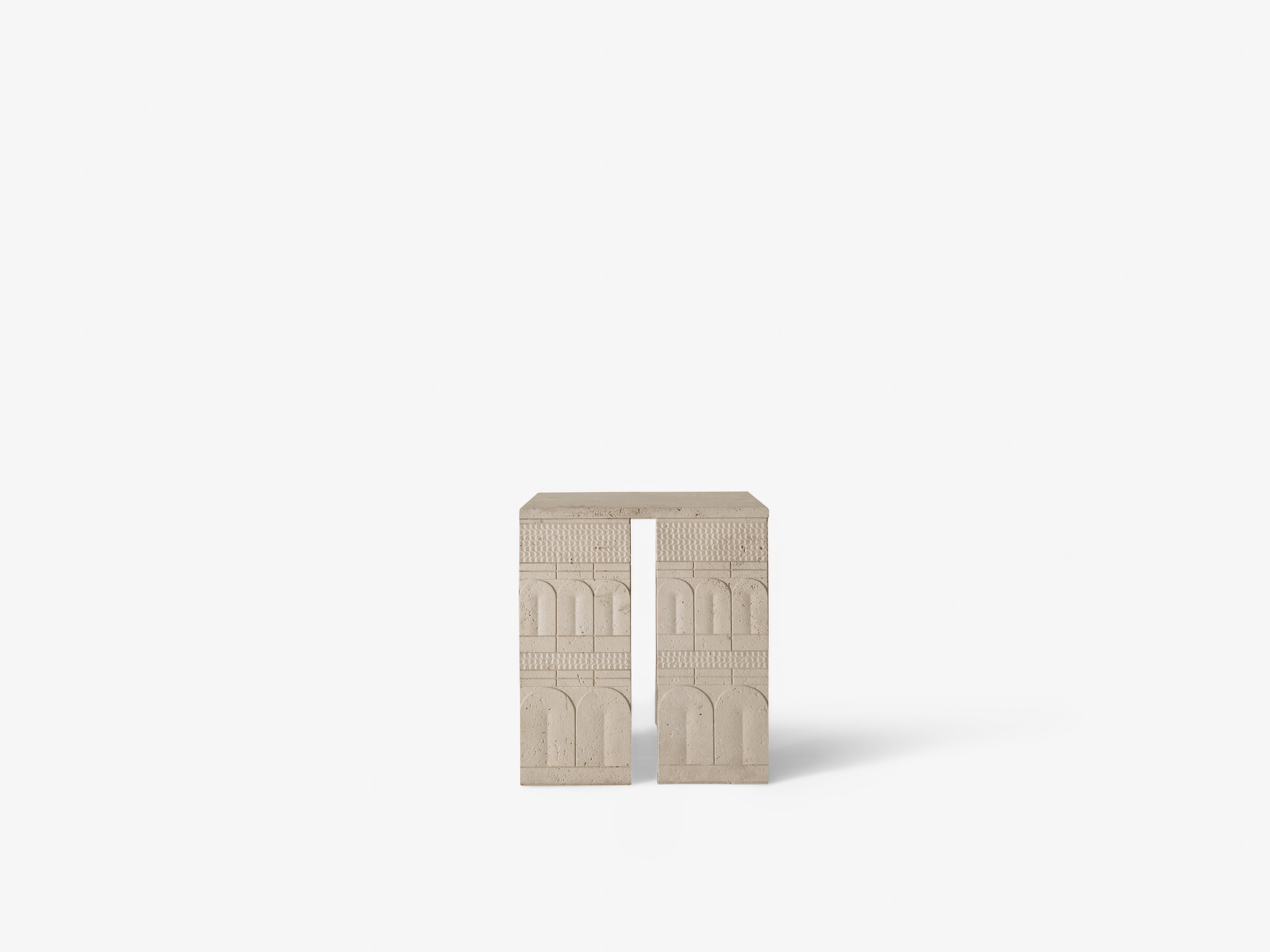Landin Side Table by OHLA STUDIO
Dimensions: D 45 x W 45 x H 50 cm 
Materials: Travertine de Veracruz.
80 kg

This collection draws upon the earliest known works of representational art. From crude symbols painstakingly chipped into cave walls,