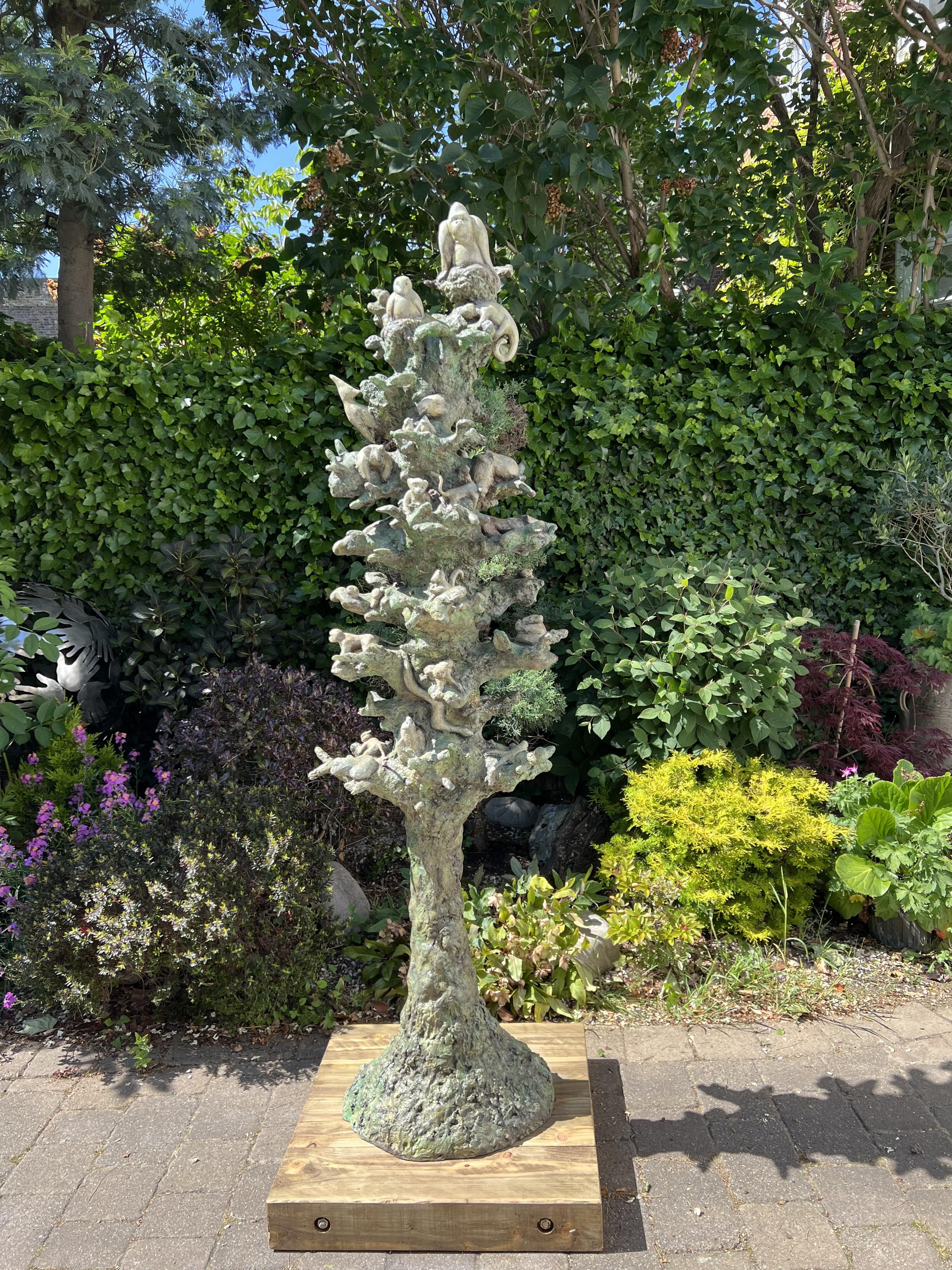 'Climbmate' is a beautiful  garden and landscape substantial sculpture.  Standing tall at two meters this stunning artwork piece took over five months to create with much attention to detail. At the heart of the sculpture  stands a sculpted tree, 