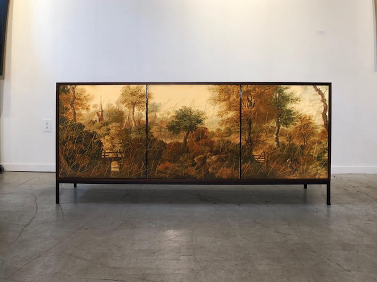 Landscape Cabinet by Morgan Clayhall, is created and finished by hand in our Toronto studio

We have used a old school landscape, digitally manipulated it and then added our classic graffiti to the image, creating a one kind piece of artwork.
The