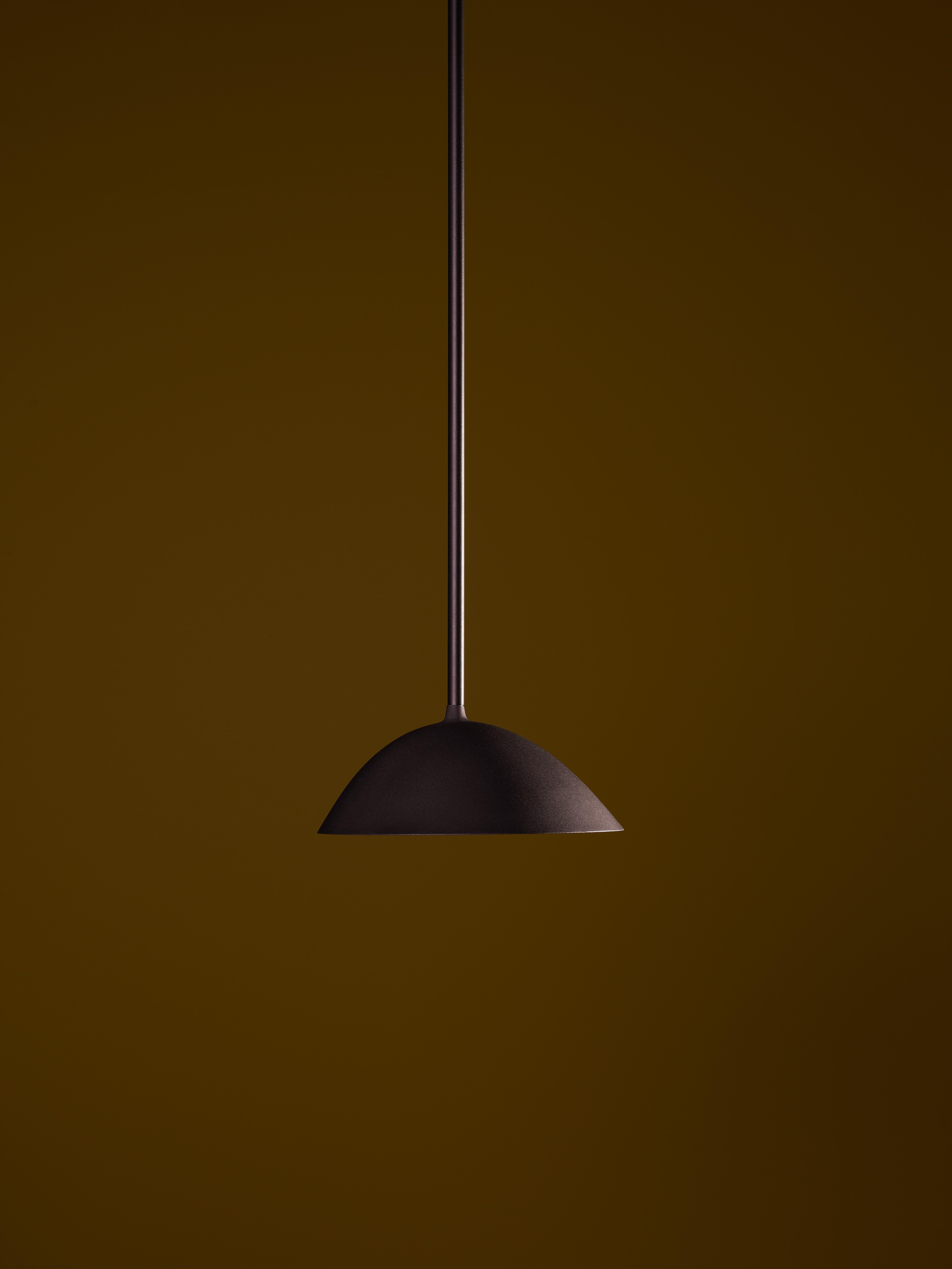 Landscape offers a distinctive asymmetrical silhouette with its wide, sloped shade. Cast in aluminium and offered in three standard finishes, the dimmable AC LEDs cast a softly dispersed light.
    