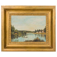 Paysage des maisons par un ruisseau