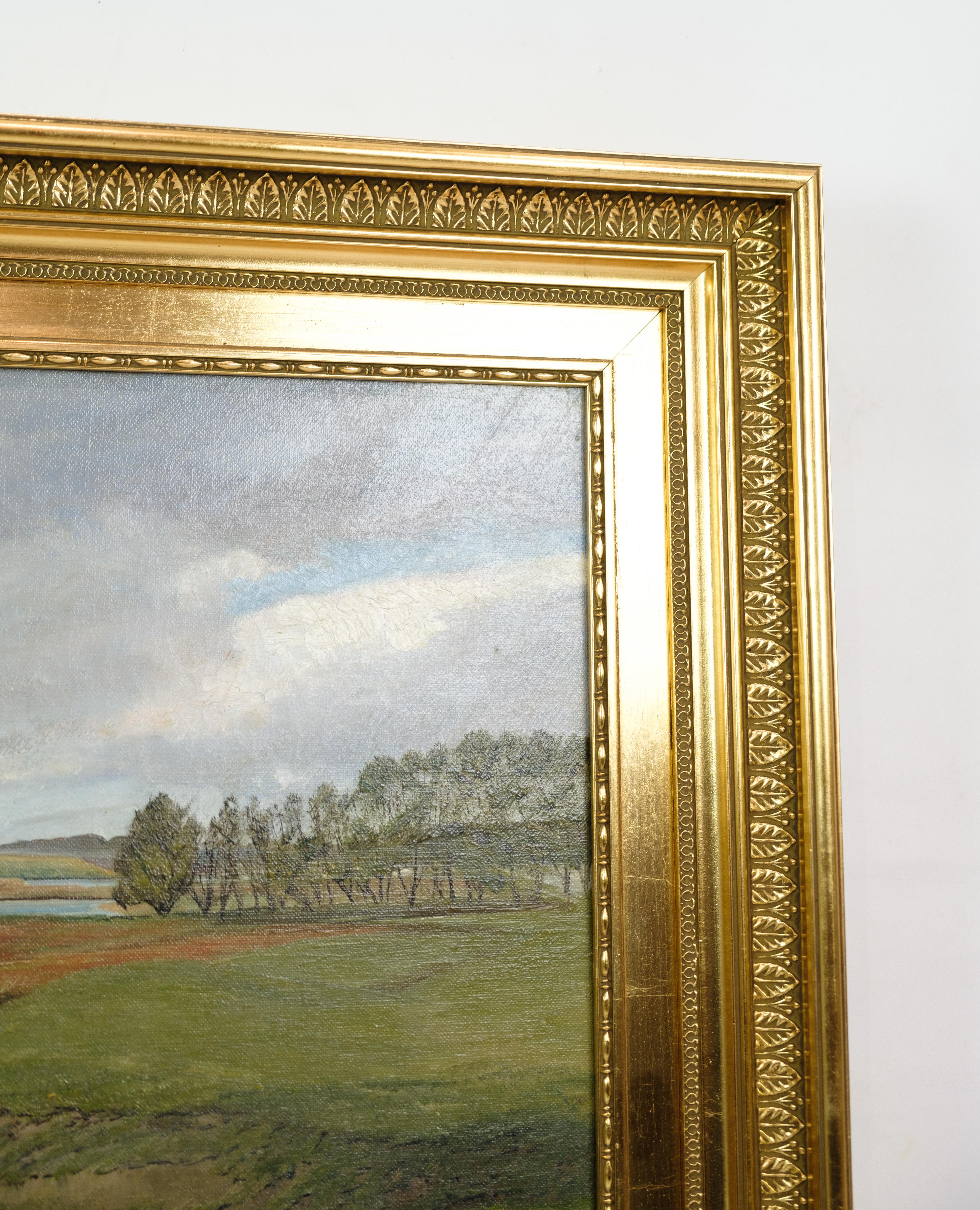Danish Landscape painting with gold leaf frame painted by Ole Ring (b.1902-d.1972) For Sale
