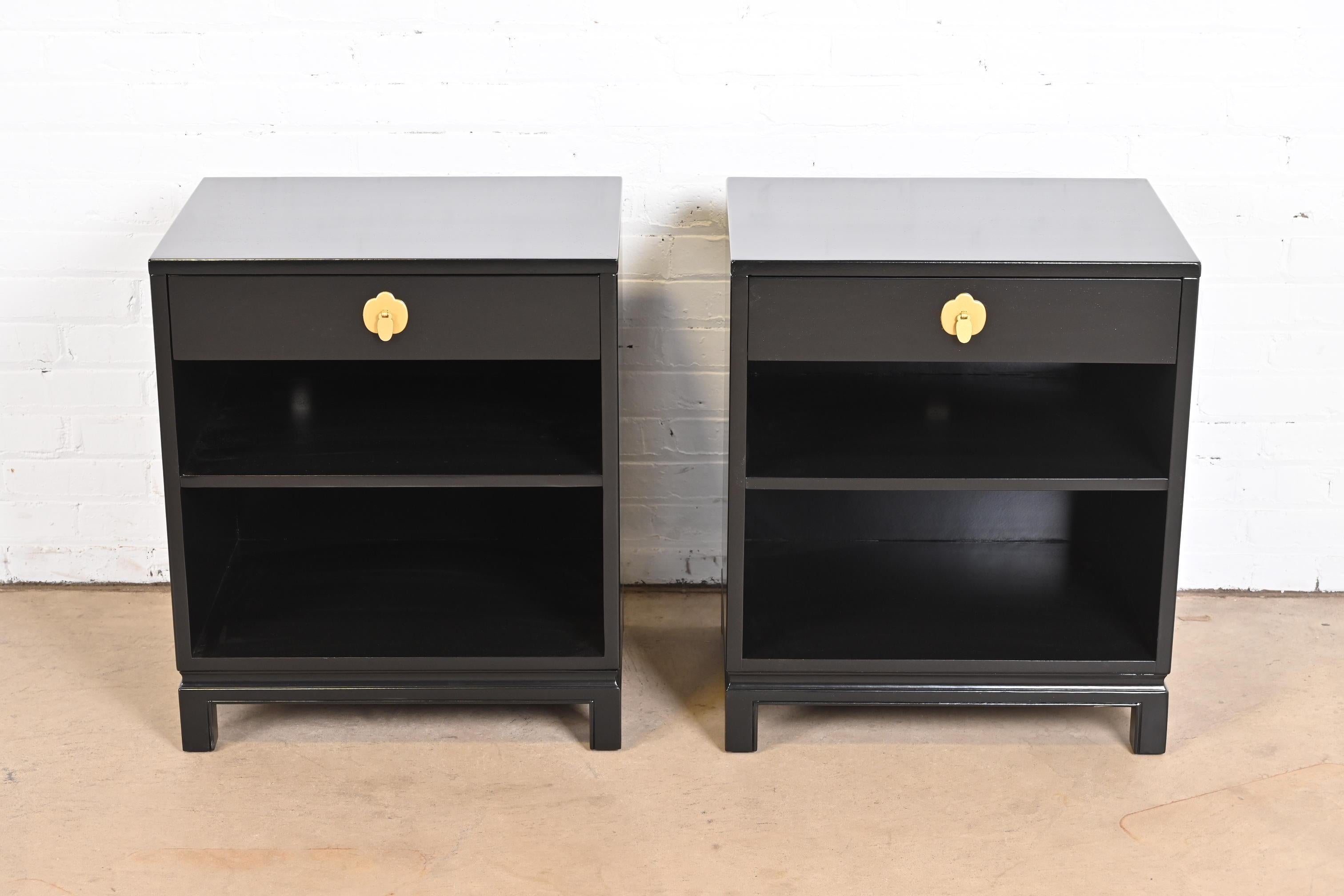 An exceptional pair of Mid-Century Modern Hollywood Regency nightstands

By Landstrom Furniture

USA, 1950s

Black lacquered mahogany, with brass hardware.

Measures: 22