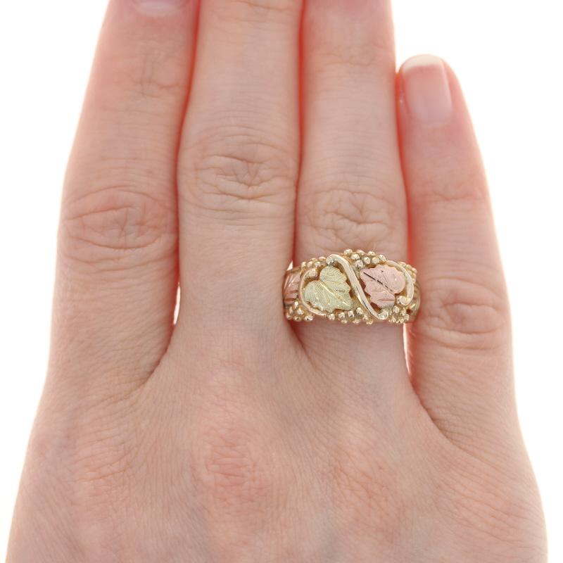 Size: 7 3/4
Sizing Fee: Down 2 sizes for $40 or up 2 sizes for $50 
(please note, the re-sizing process will affect the ring's stamps)

Brand: Landstrom's
Design: Black Hills Gold

Metal Content: 10k Yellow Gold, 12k Rose Gold, & 12k Green