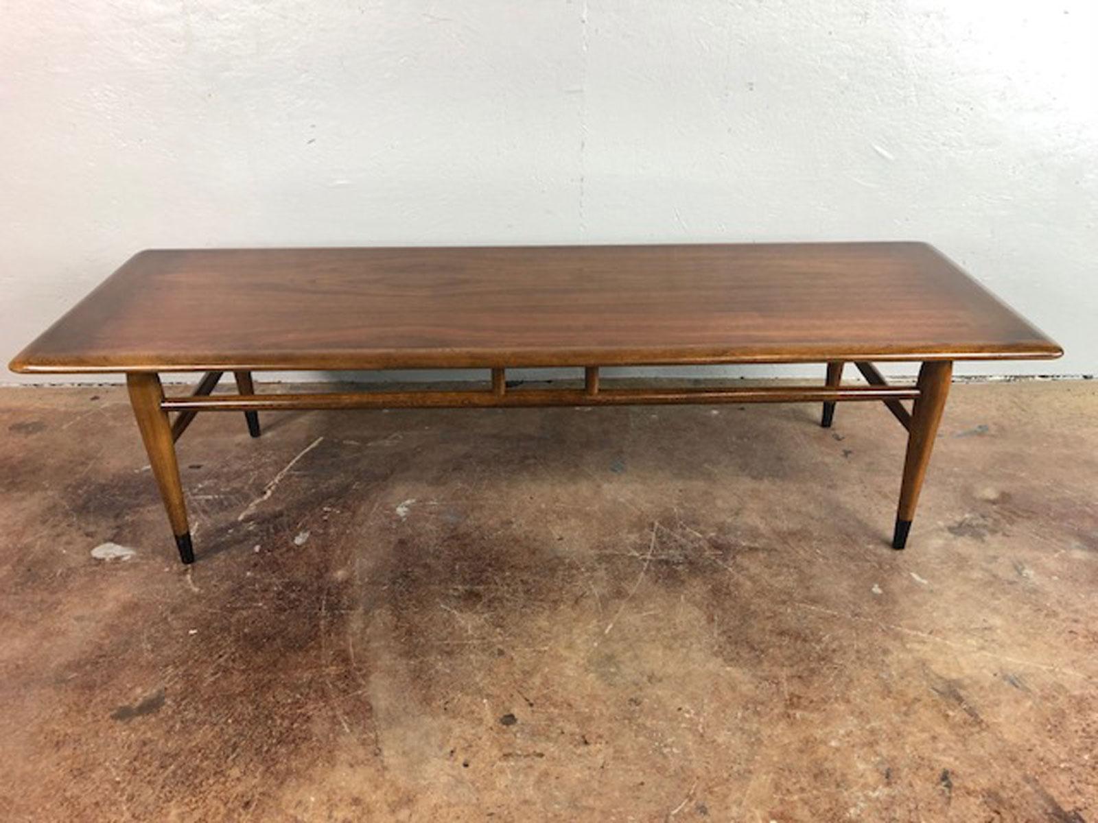 Mid-Century Modern coffee table by Lane in walnut and ash, circa 1960s. Original condition.