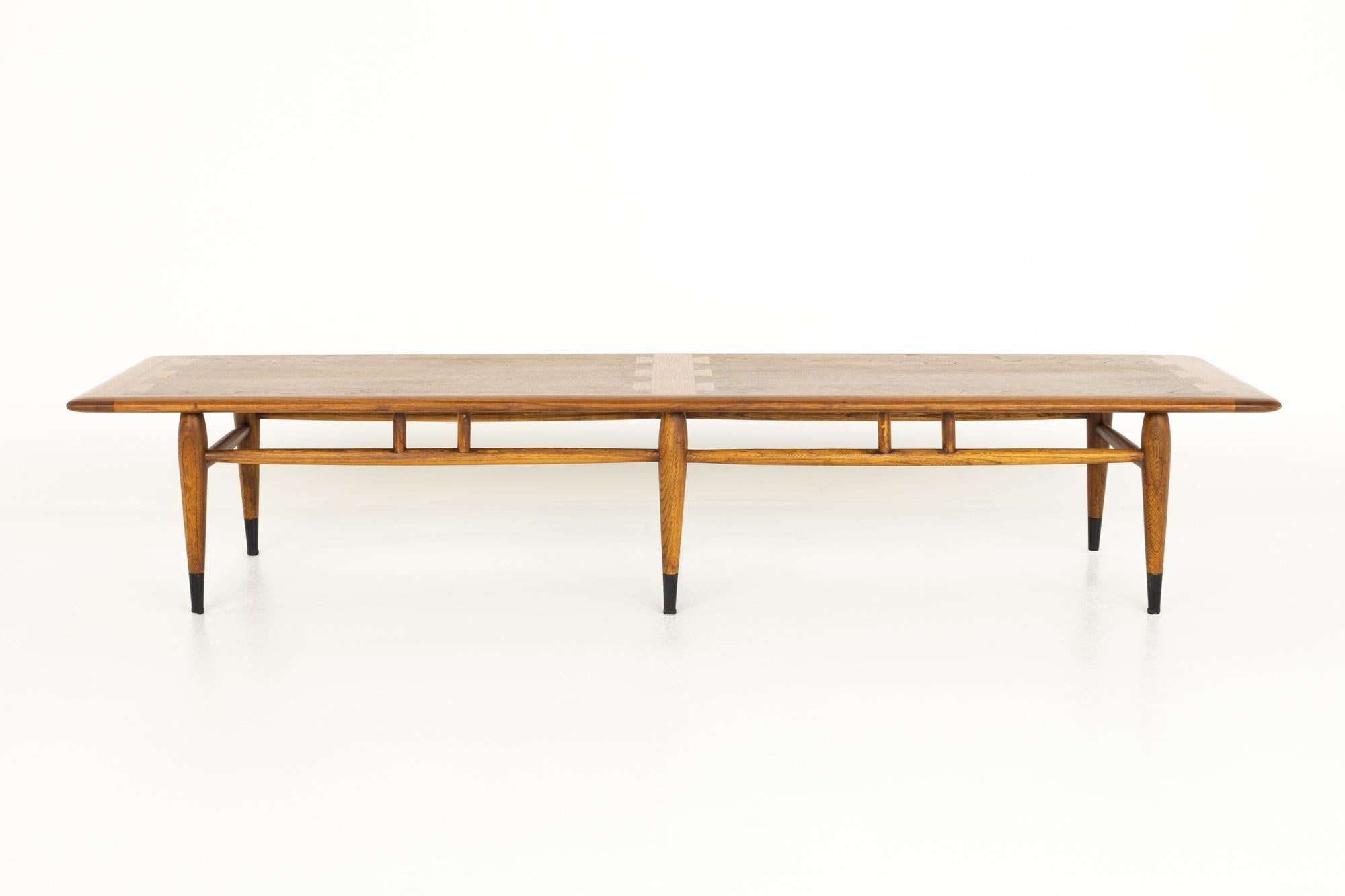 Lane Acclaim Mid Century Extra Long Walnut Dovetail Coffee Table

This coffee table measures: 70 wide x 18 deep x 13 inches high

?All pieces of furniture can be had in what we call restored vintage condition. That means the piece is restored