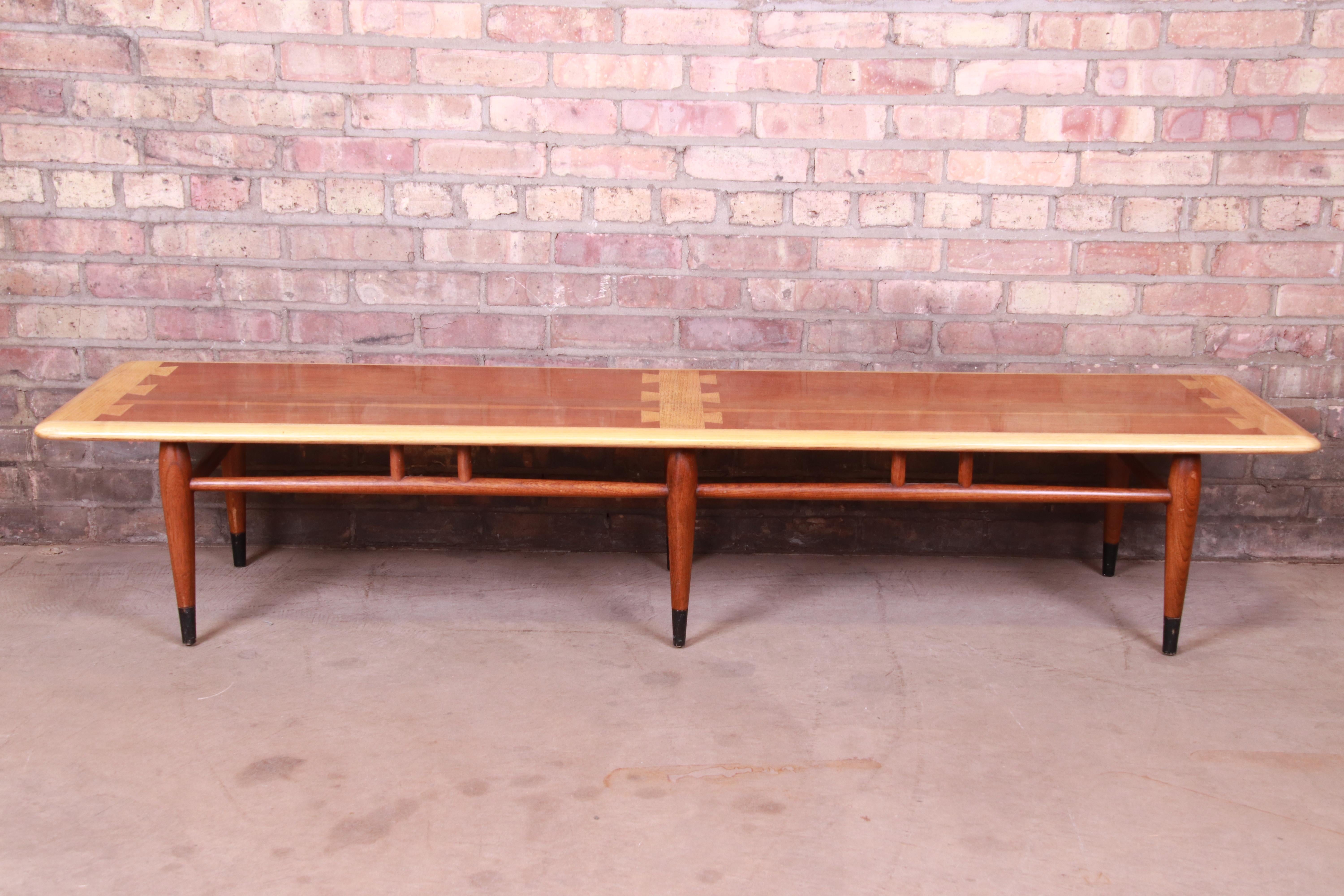 An exceptional Mid-Century Modern extra long surfboard coffee table

Designed by Andre Bus for Lane Furniture 