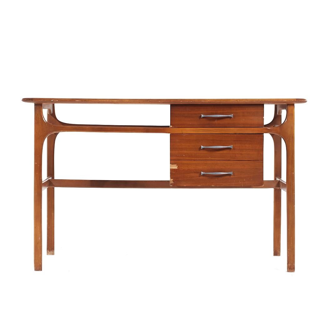 Lane Acclaim Mid Century Walnut Desk

This desk measures: 48 wide x 22 deep x 29.5 high, with a chair clearance of 28.5 inches

All pieces of furniture can be had in what we call restored vintage condition. That means the piece is restored upon