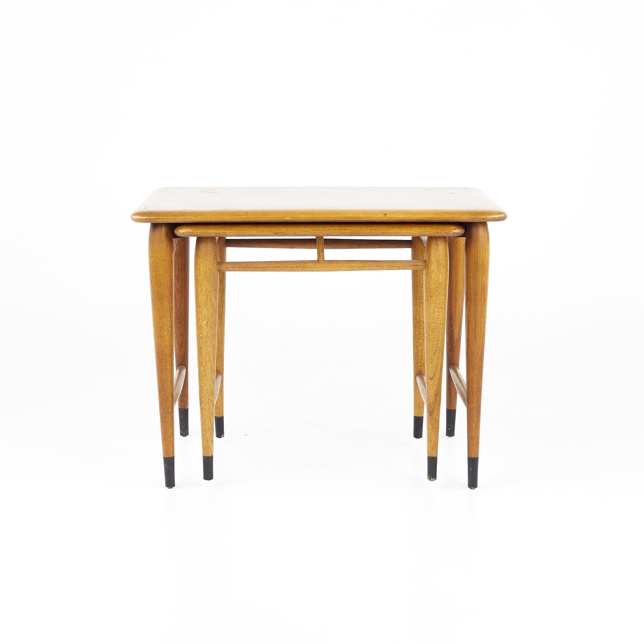 Lane Acclaim mid century walnut nesting tables

Large table measures: 26.25 wide x 17 deep x 20.5 inches high

?All pieces of furniture can be had in what we call restored vintage condition. That means the piece is restored upon purchase so it’s