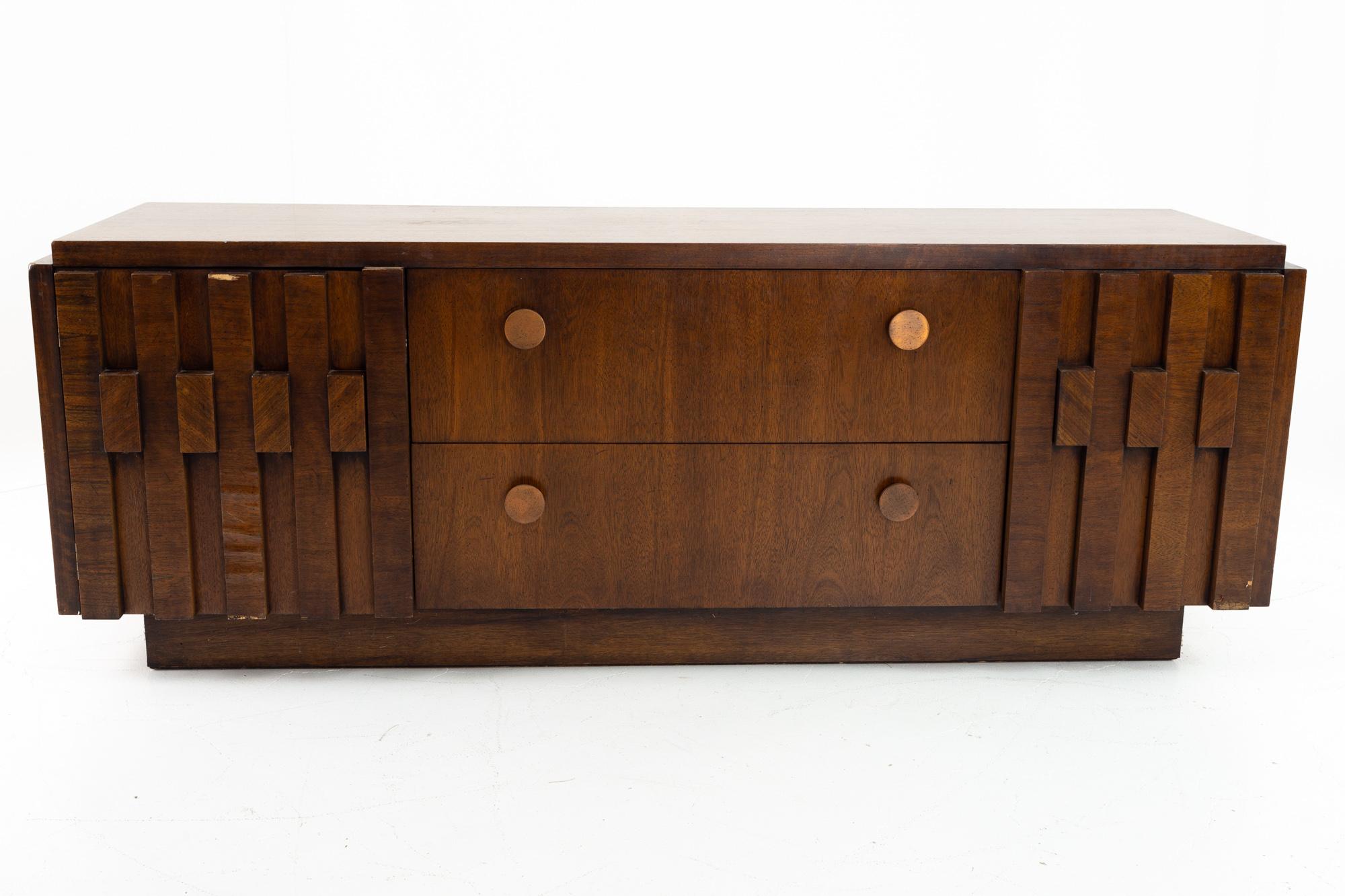 Lane Brutalist mid century low profile credenza
Measures: 66 wide x 19.25 deep x 24.25 high

All pieces of furniture can be had in what we call restored vintage condition. That means the piece is restored upon purchase so it’s free of watermarks,