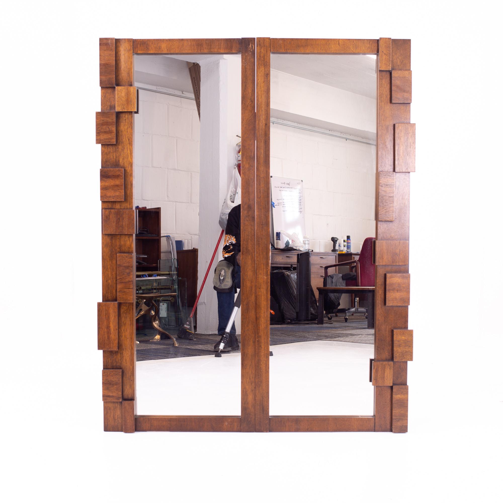 Lane Brutalist mid century mirrors - pair
Each mirror measures: 19 wide x 1.25 deep x 48.75 high

This price includes getting this set in what we call restored vintage condition. Upon purchase it is fixed so it’s free of watermarks, chips, or