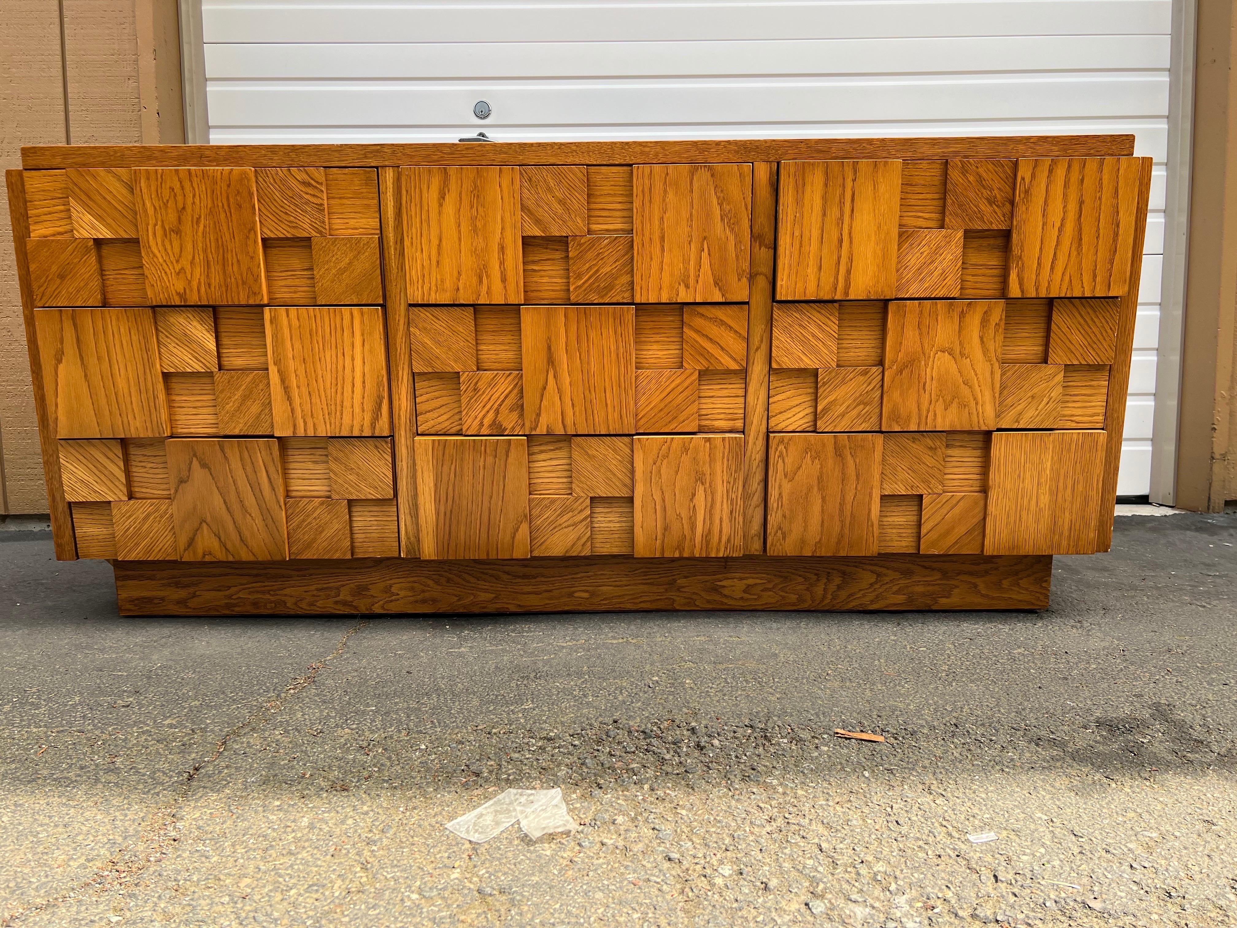 Lane Brutalist mid century oak lowboy dresser This dresser measures: 68 wide x 18.75 deep x 30.25 inches high.