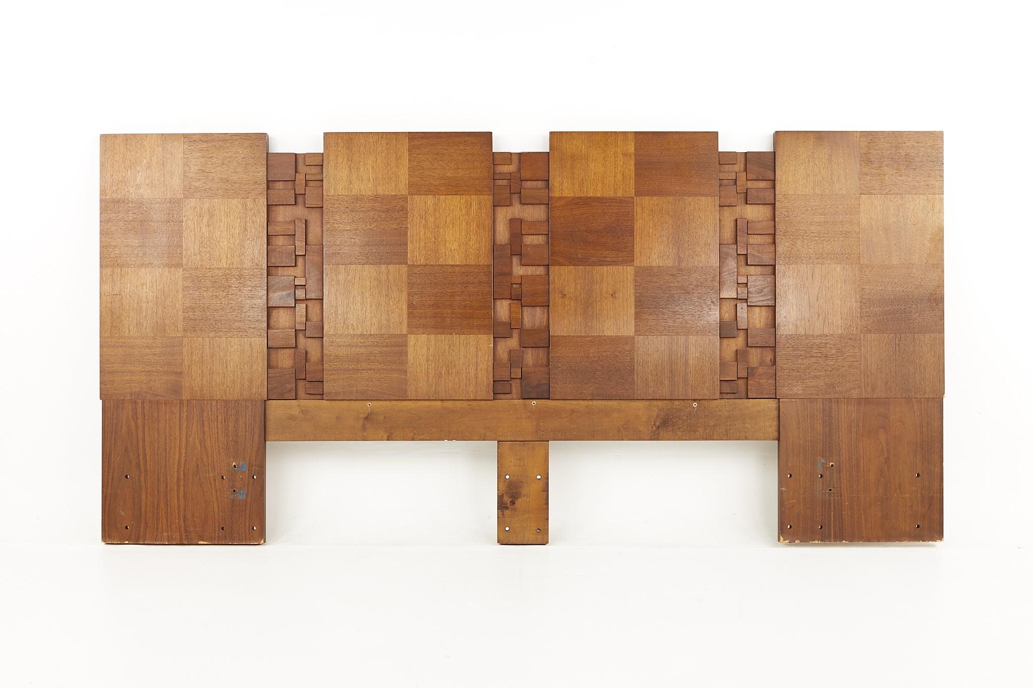 Lane Brutalist mid-century walnut king headboard

Headboard measures: 82.5 wide x 1.25 deep x 40 inches high

All pieces of furniture can be had in what we call restored vintage condition. That means the piece is restored upon purchase so it’s