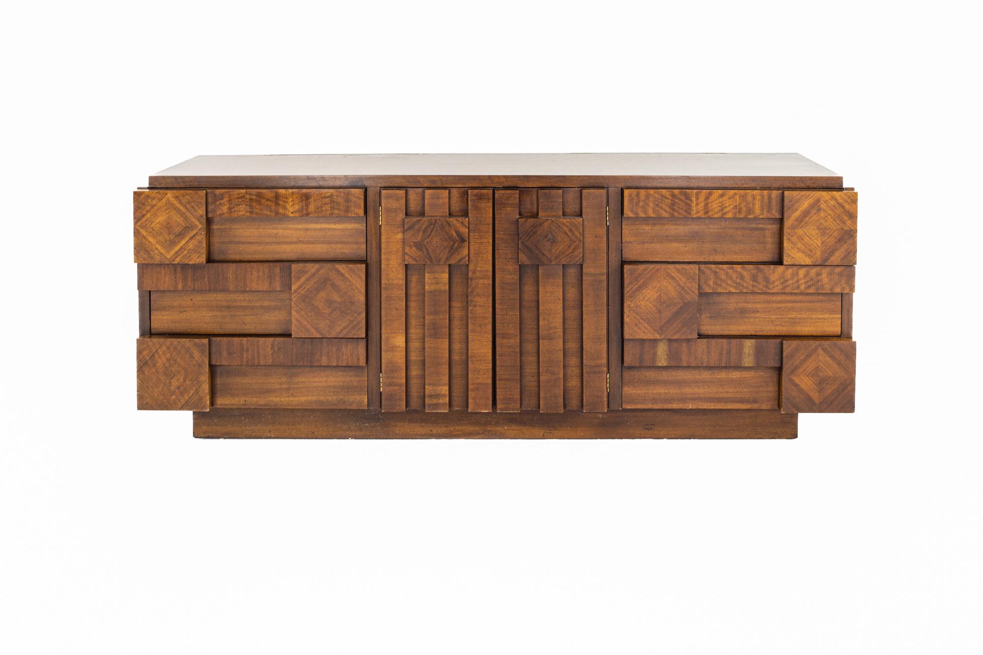 Lane Brutalist Mid Century Walnut Lowboy Dresser

The dresser measures: 79 wide x 19.5 deep x 31 inches high

All pieces of furniture can be had in what we call restored vintage condition. That means the piece is restored upon purchase so it’s