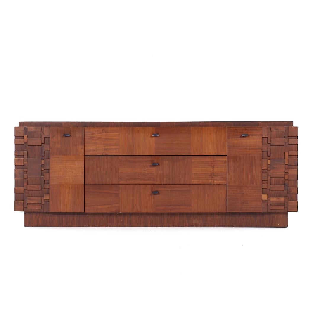 Lane Brutalist Mid Century Walnut Lowboy Dresser

This lowboy measures: 80 wide x 20.25 deep x 30.25 inches high

All pieces of furniture can be had in what we call restored vintage condition. That means the piece is restored upon purchase so it’s