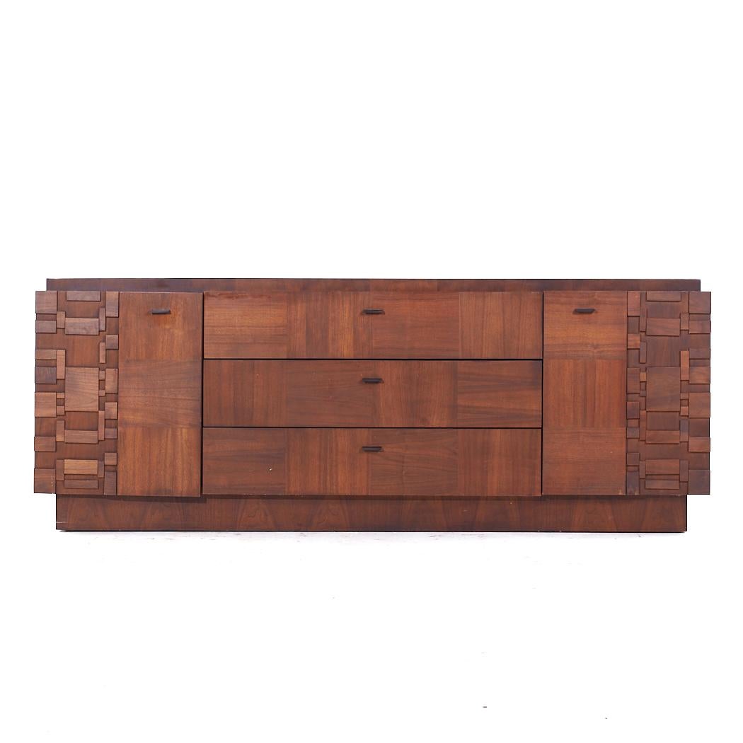 Lane Brutalist Mid Century Walnut Lowboy Dresser

This lowboy measures: 79.75 wide x 20.25 deep x 30.75 inches high

All pieces of furniture can be had in what we call restored vintage condition. That means the piece is restored upon purchase so