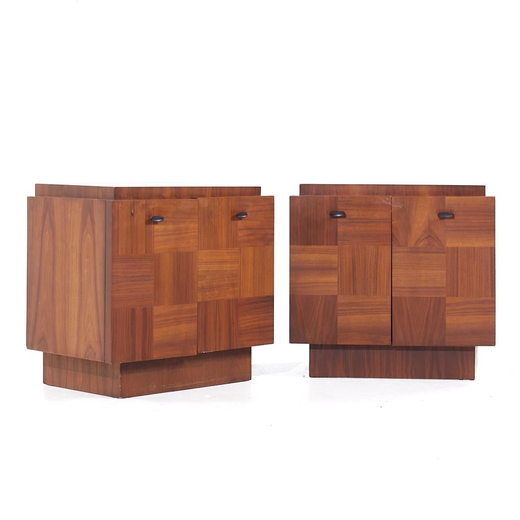 Lane Brutalist Mid Century Walnut Nightstands - Pair

Each nightstand measures: 26 wide x 17 deep x 24.75 inches high

All pieces of furniture can be had in what we call restored vintage condition. That means the piece is restored upon purchase so