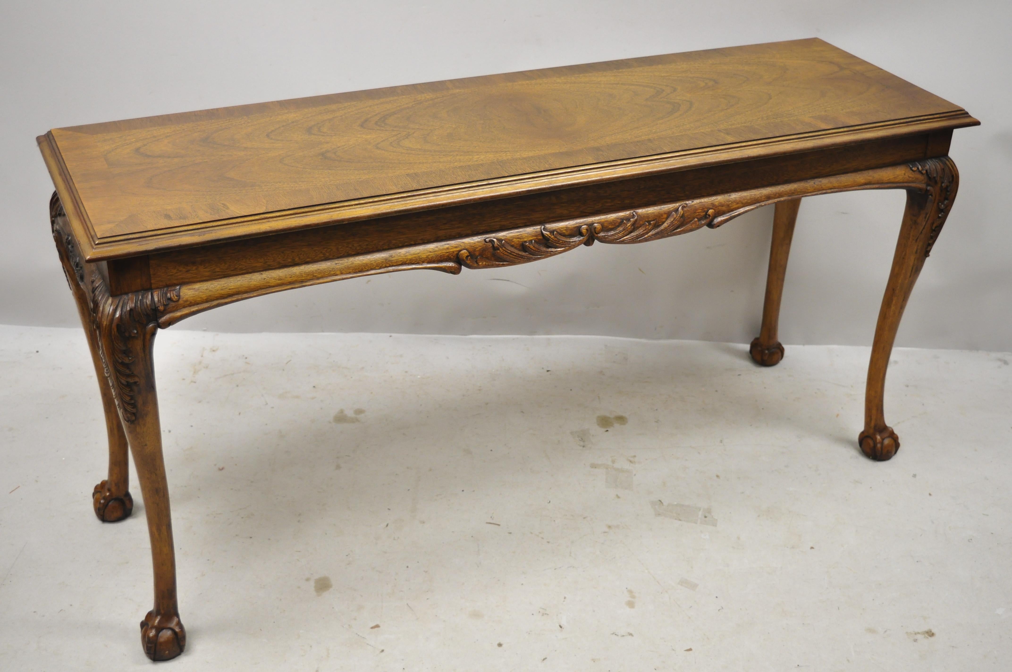 Lane Chinese Chippendale banded mahogany ball and claw console sofa hall table. Item features solid wood construction, beautiful wood grain, nicely carved details, original stamp, carved ball and claw feet, very nice vintage item, quality American