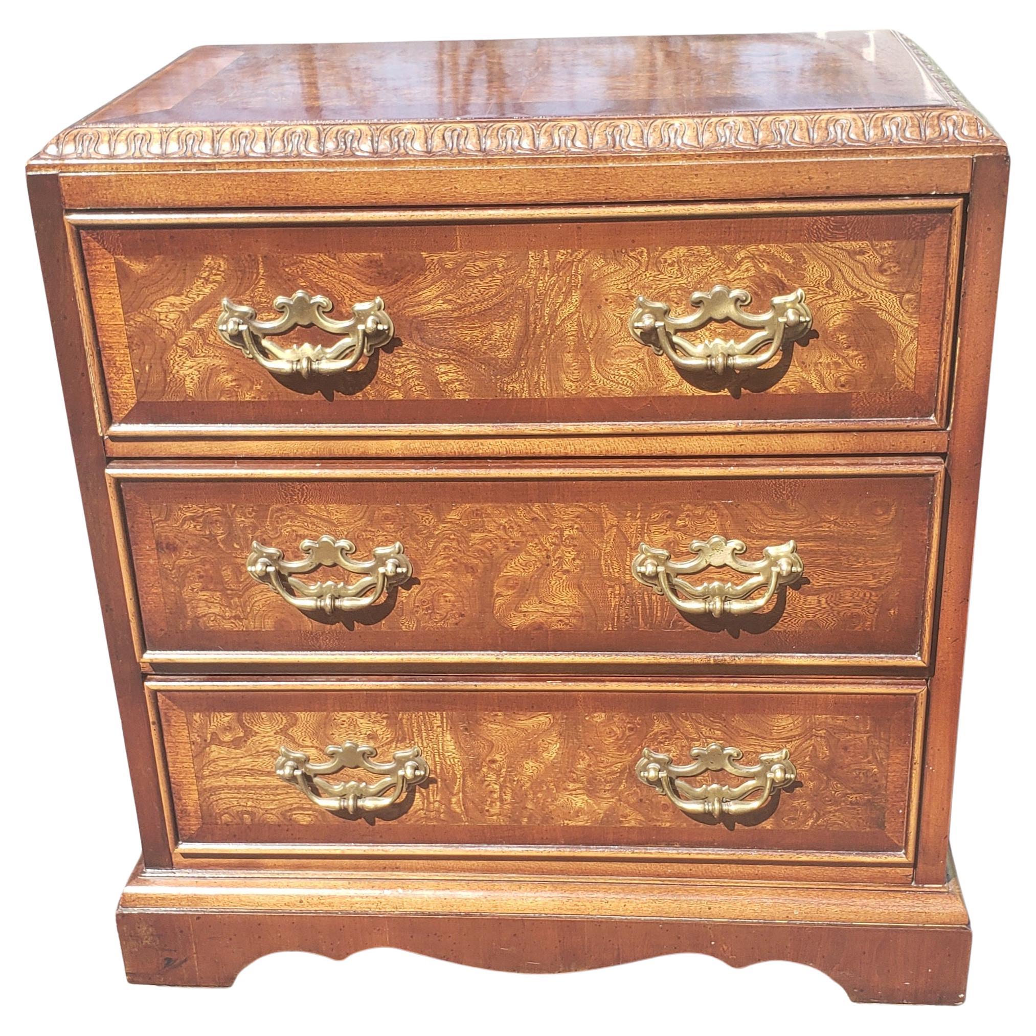 Amazing Lane Earl's Court Collection Burl and Banded Mahogany Bedside Chest in very good vintage condition. 
Burl mahogany banded top surrounded by exquisite carvings around the top edges. Original Chippendale hardware. Side handles. 
Minor signs of