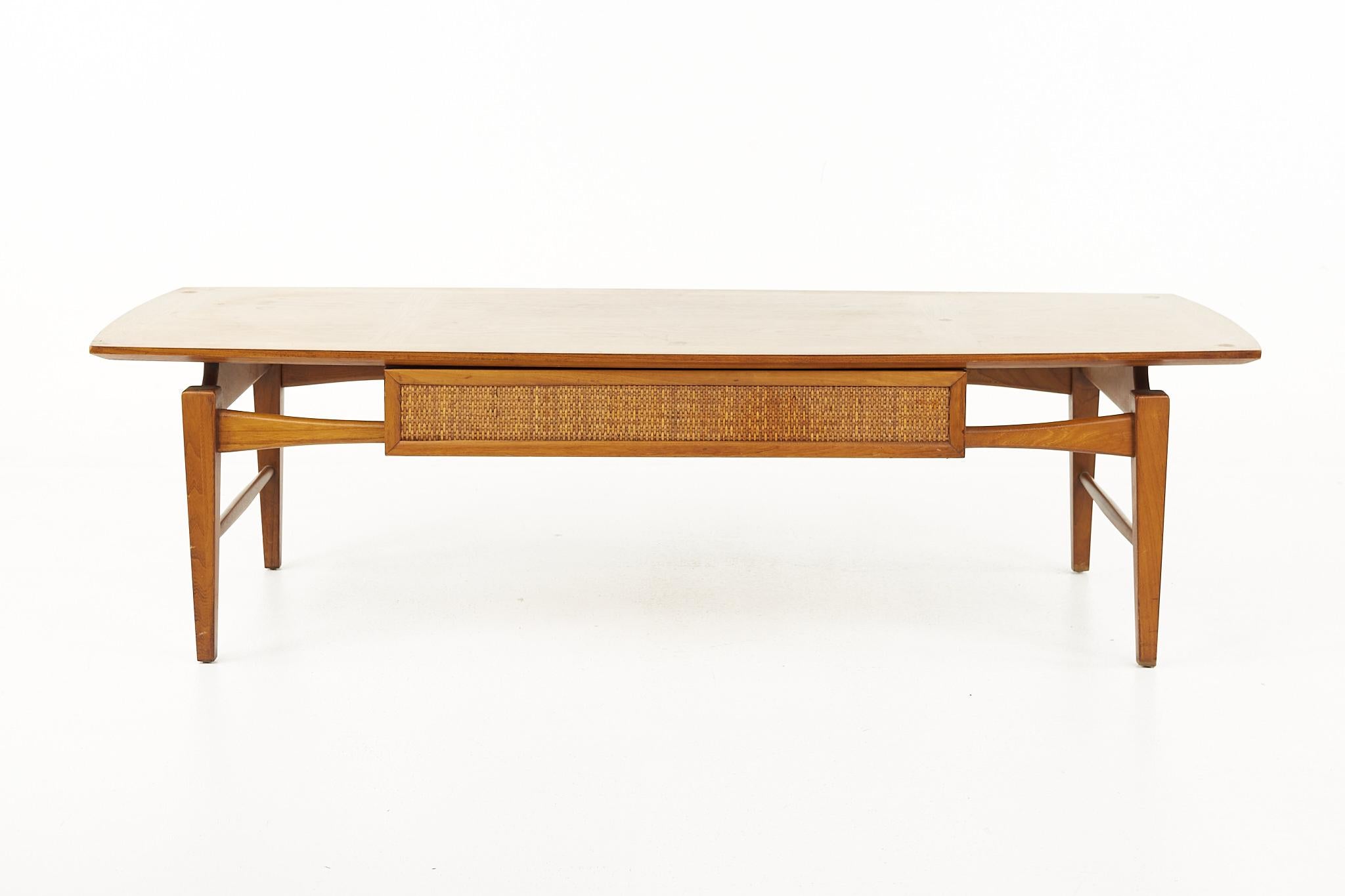 Lane Esteem mid century walnut and cane front inlaid coffee table 

The coffee table measures: 53 wide x 19 deep x 15 inches high

All pieces of furniture can be had in what we call restored vintage condition. That means the piece is restored