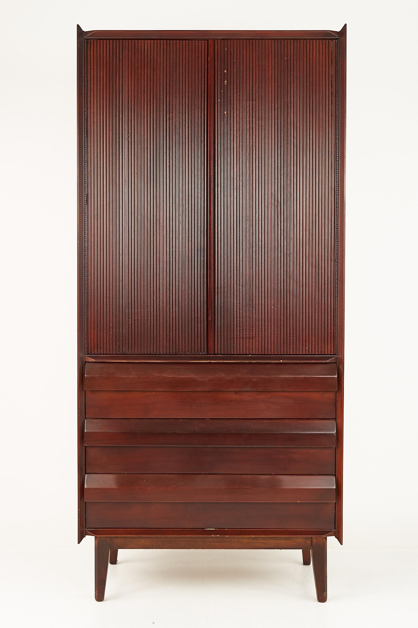 Lane First Edition mid-century gentlemans chest armoire

This armoire measures: 31.75 wide x 18 deep x 69 inches high

All pieces of furniture can be had in what we call restored vintage condition. That means the piece is restored upon purchase