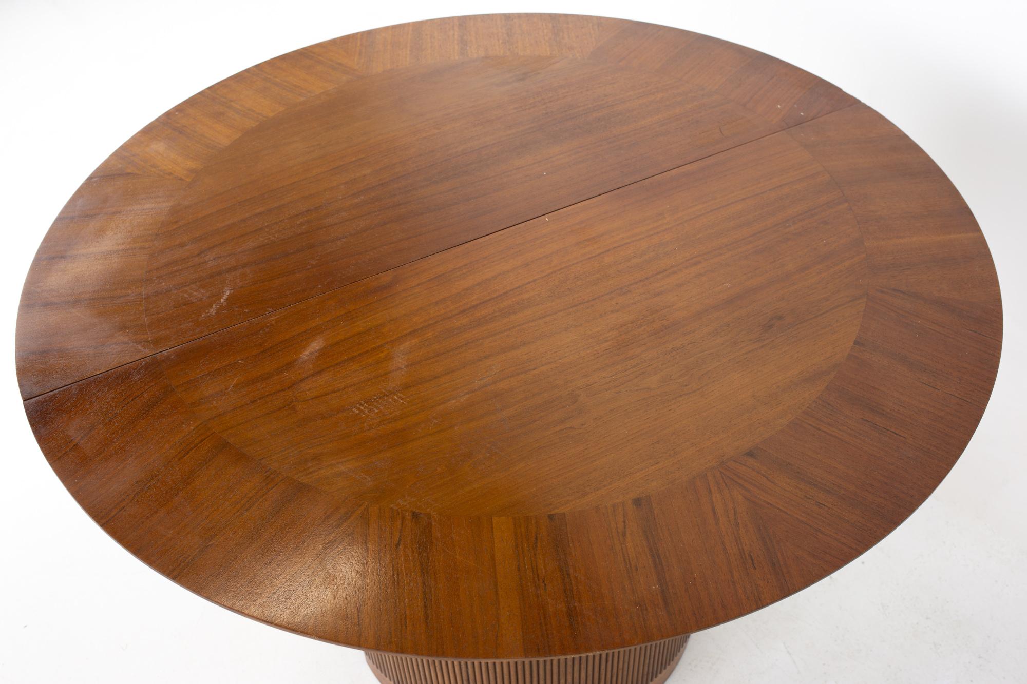 Mid-Century Modern Lane First Edition Mid Century Walnut Expanding Round Pedestal Dining Table