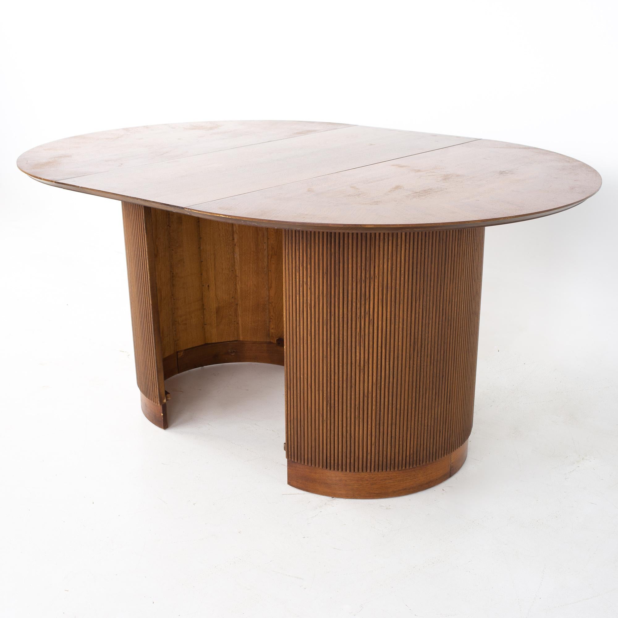 Late 20th Century Lane First Edition Mid Century Walnut Expanding Round Pedestal Dining Table