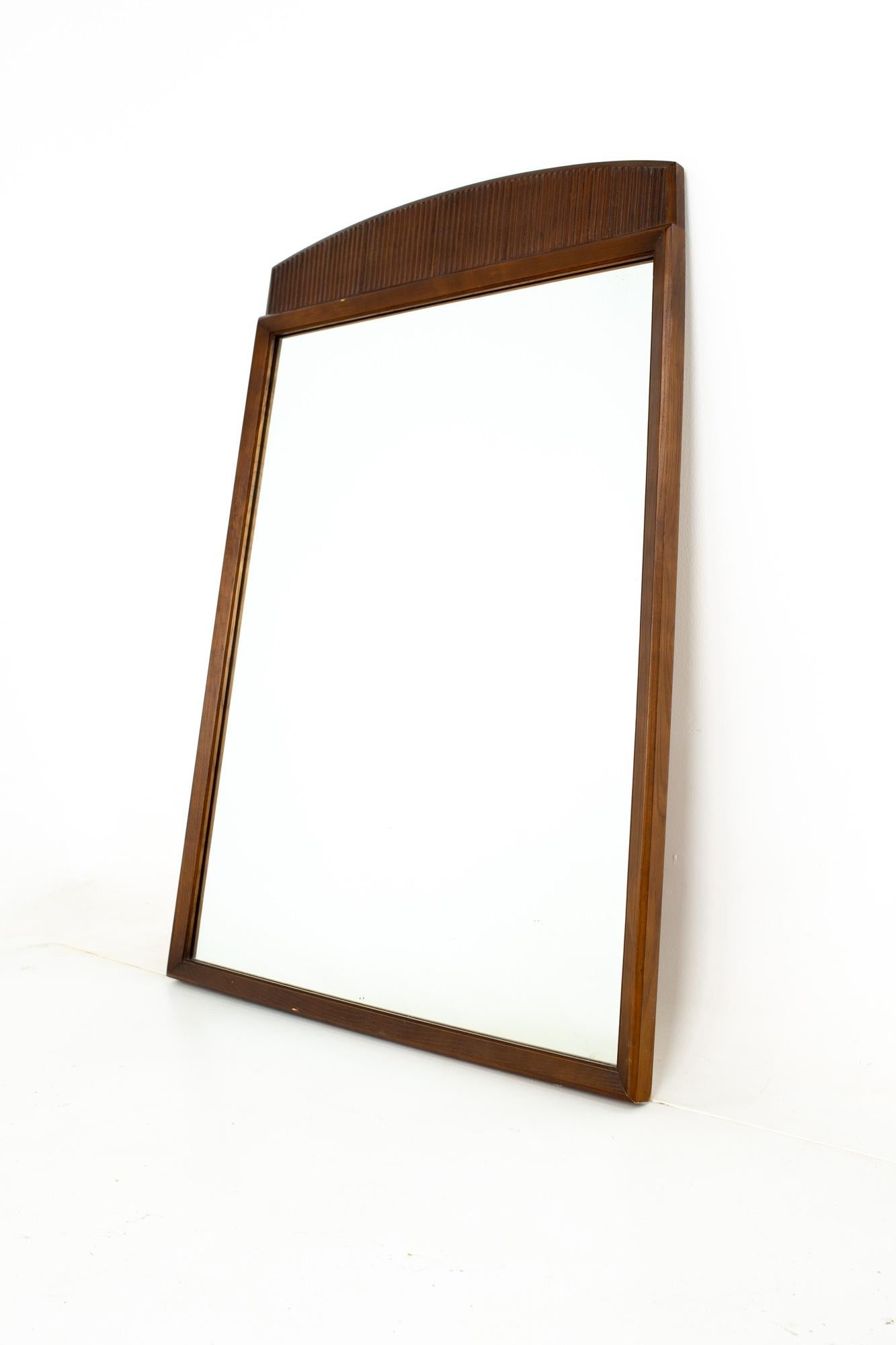 Lane first edition mid century walnut mirror
Mirror measures: 32 wide x 1.5 deep x 43.5 inches high

All pieces of furniture can be had in what we call restored vintage condition. That means the piece is restored upon purchase so it’s free of
