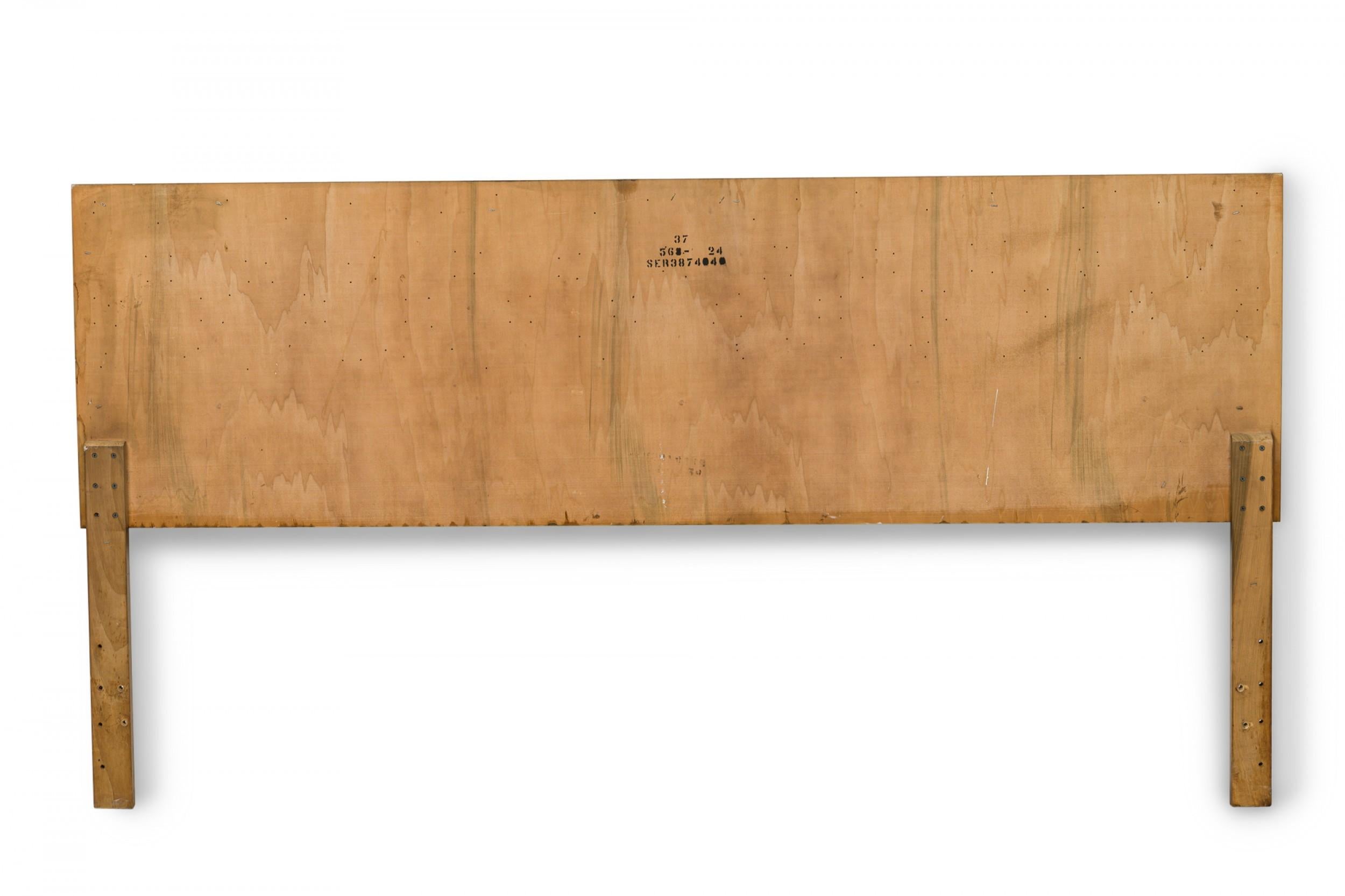 American Mid-Century king-size cubist design blond wood headboard with 2 rows of decorative square cut-outs. (LANE FURNITURE)

Some chipping and losses to wood. Headboard only, does not include rails or footboard.