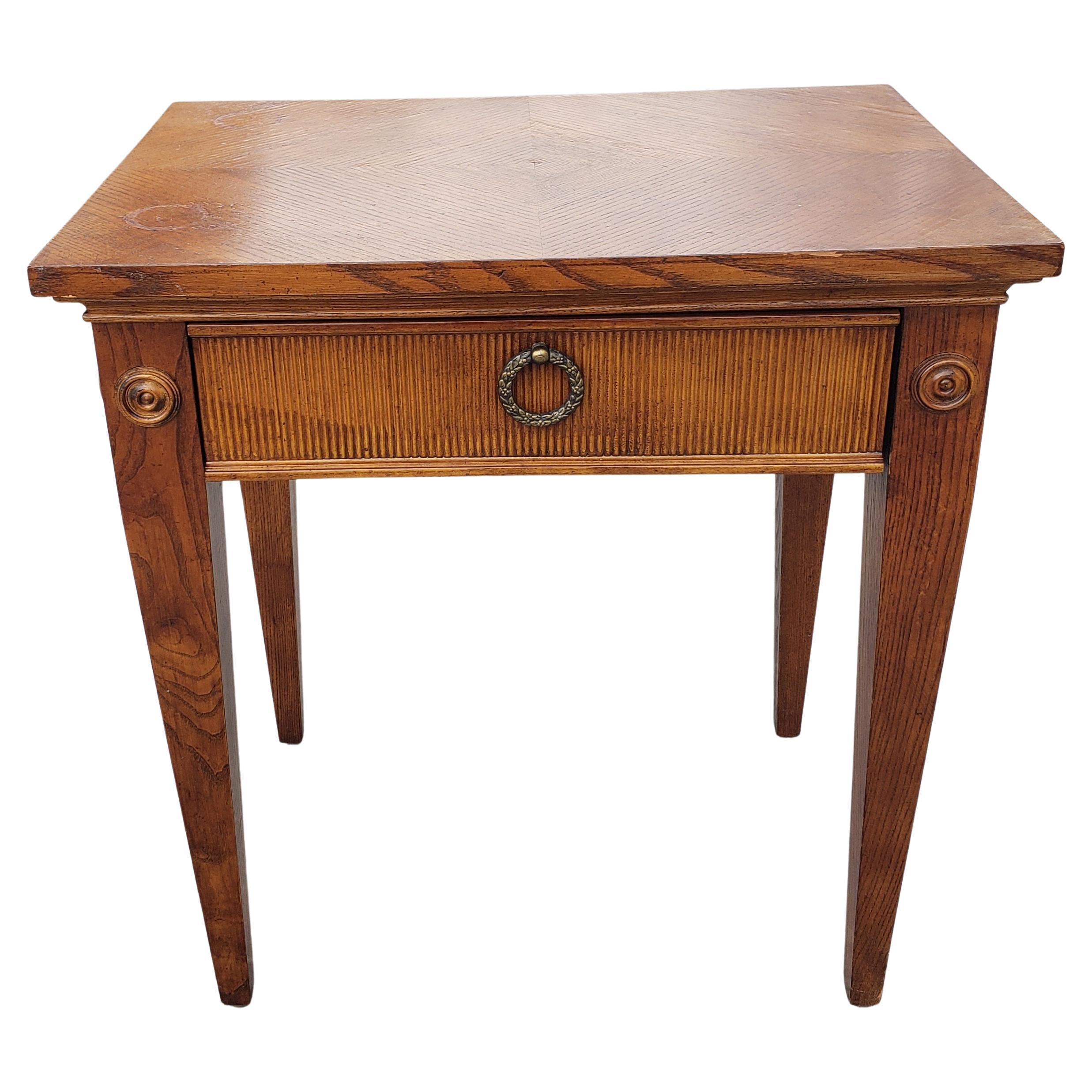 Lane furniture fruitwood one-drawer side table with tapered legs. 
Measures 24
