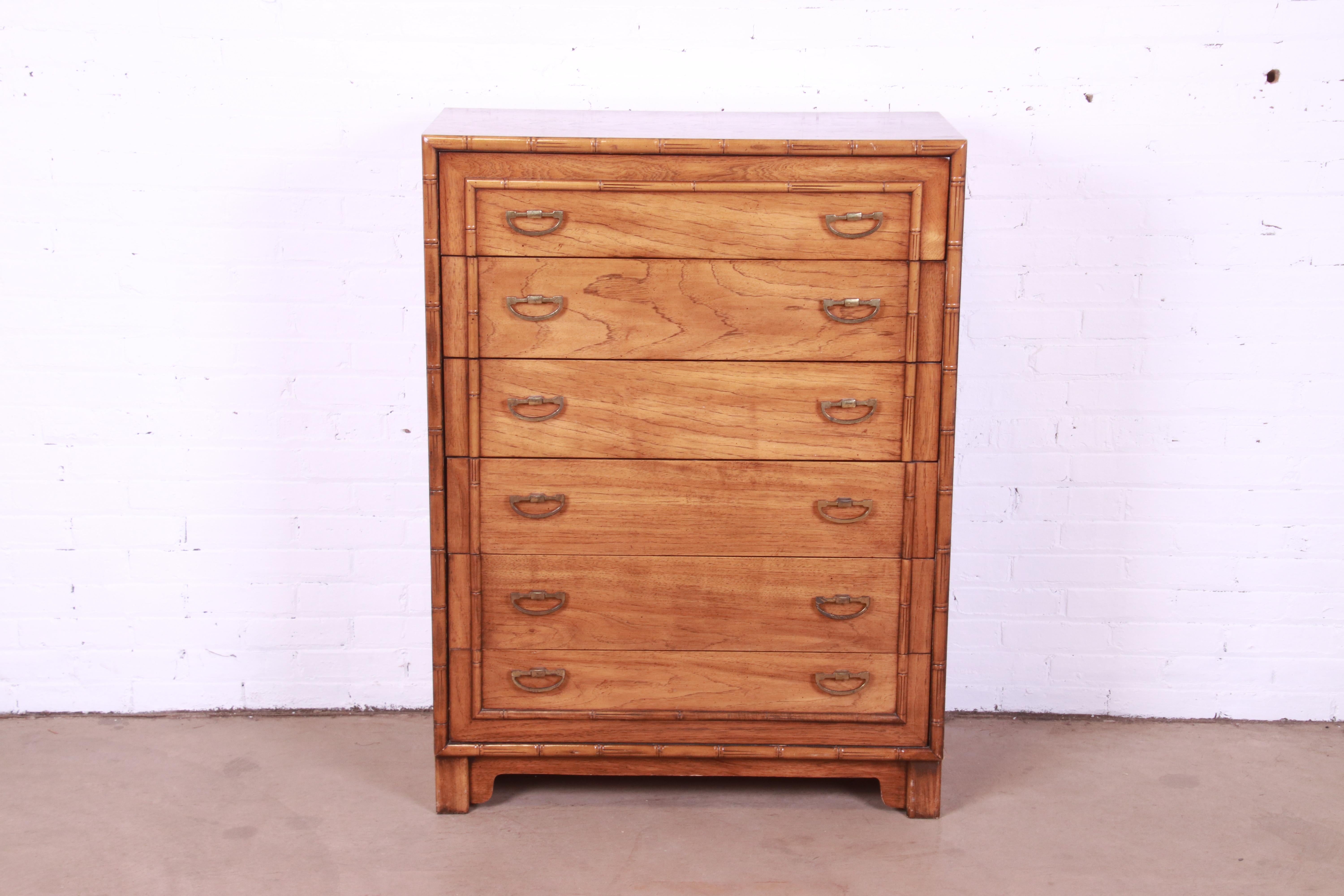A gorgeous Mid-Century Modern Hollywood Regency six-drawer highboy dresser chest

By Lane Furniture

USA, Circa 1970s

Walnut, with faux bamboo trim and original brass hardware.

Measures: 35