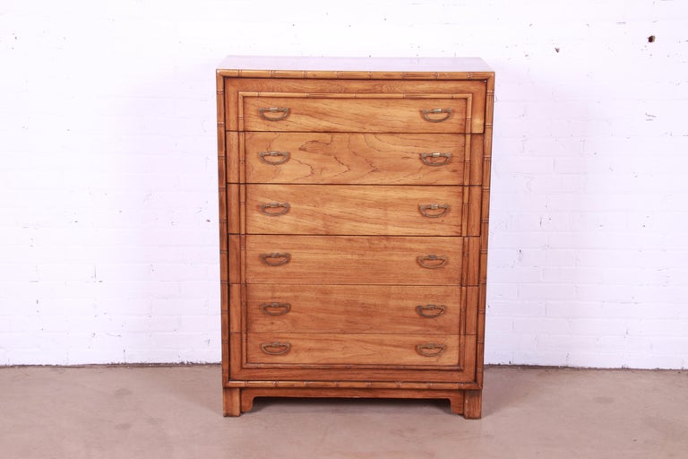 A gorgeous Mid-Century Modern Hollywood Regency six-drawer highboy dresser chest

By Lane Furniture

USA, Circa 1970s

Walnut, with faux bamboo trim and original brass hardware.

Measures: 35