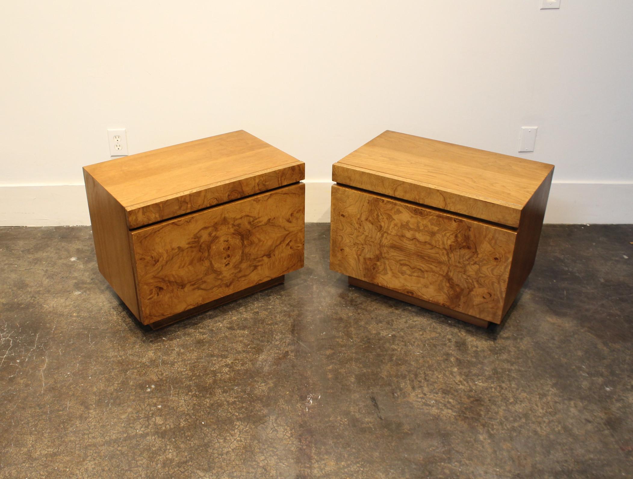 Beautiful pair of 1970s burl wood nightstands. Originally designed by Roland Carter for Lane Furniture, this 