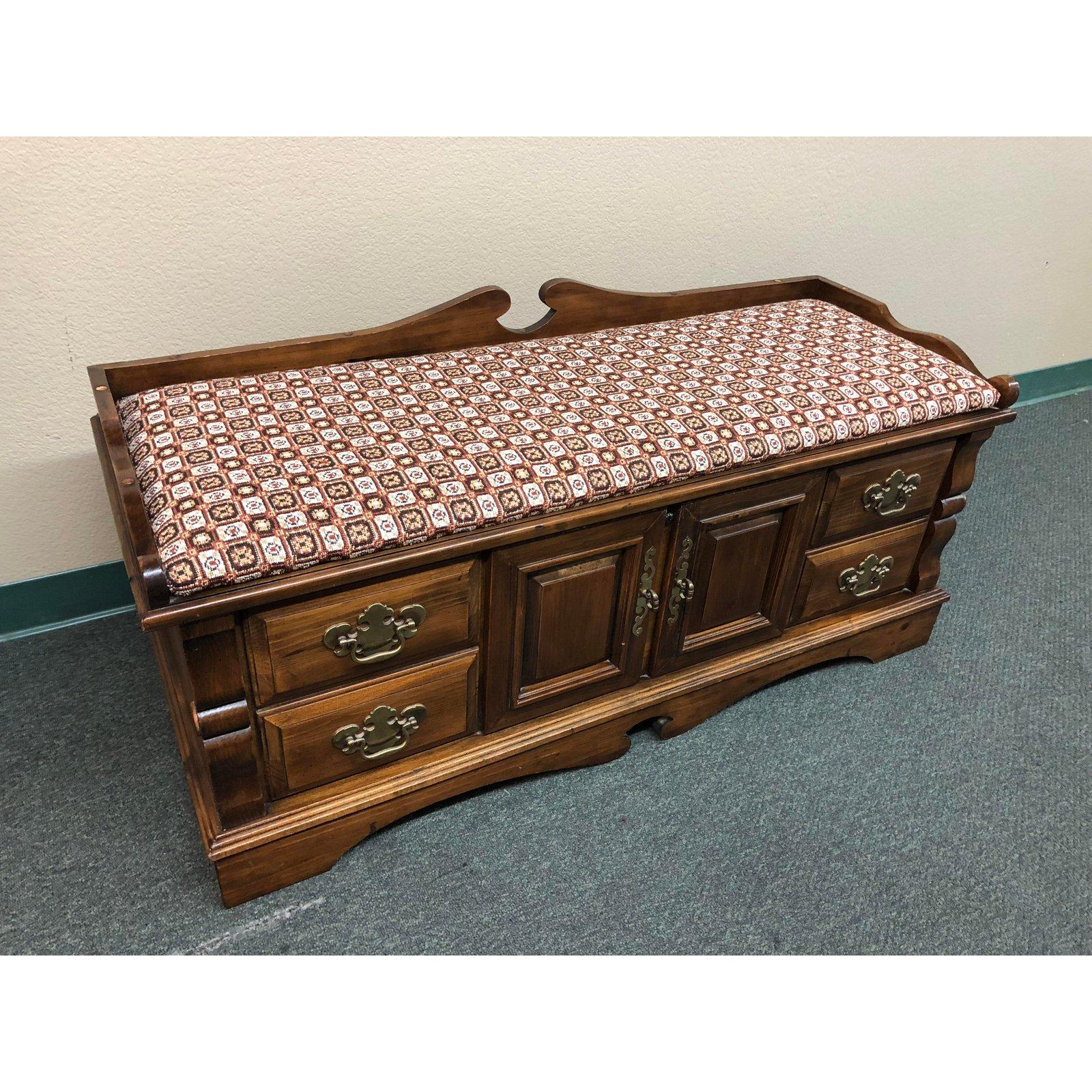 This is a vintage Lane Furniture hope chest perfect for blanket storage, toys, books etc. Cushion onto still firm and good condition. Has a push in lock to open the inside, no keys to lock. Made out of cedar, wood looks really good from over the