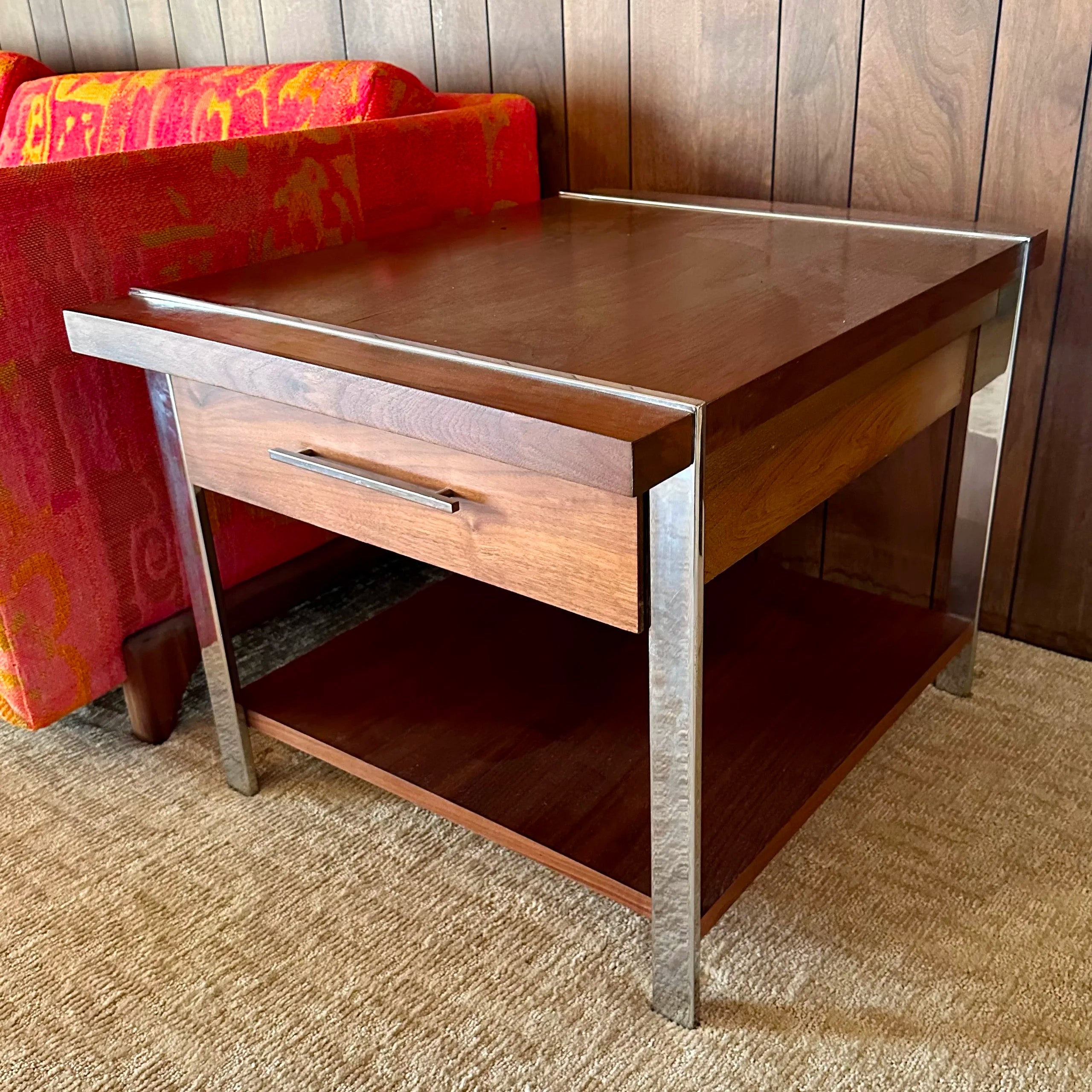 Lane Furniture Walnut, Rosewood, and Chrome End Table

This beautiful end table is one of the showcase pieces made by Lane Furniture. This piece is beautifully crafted, rare, and sought after. The table is constructed of walnut and rosewood, with
