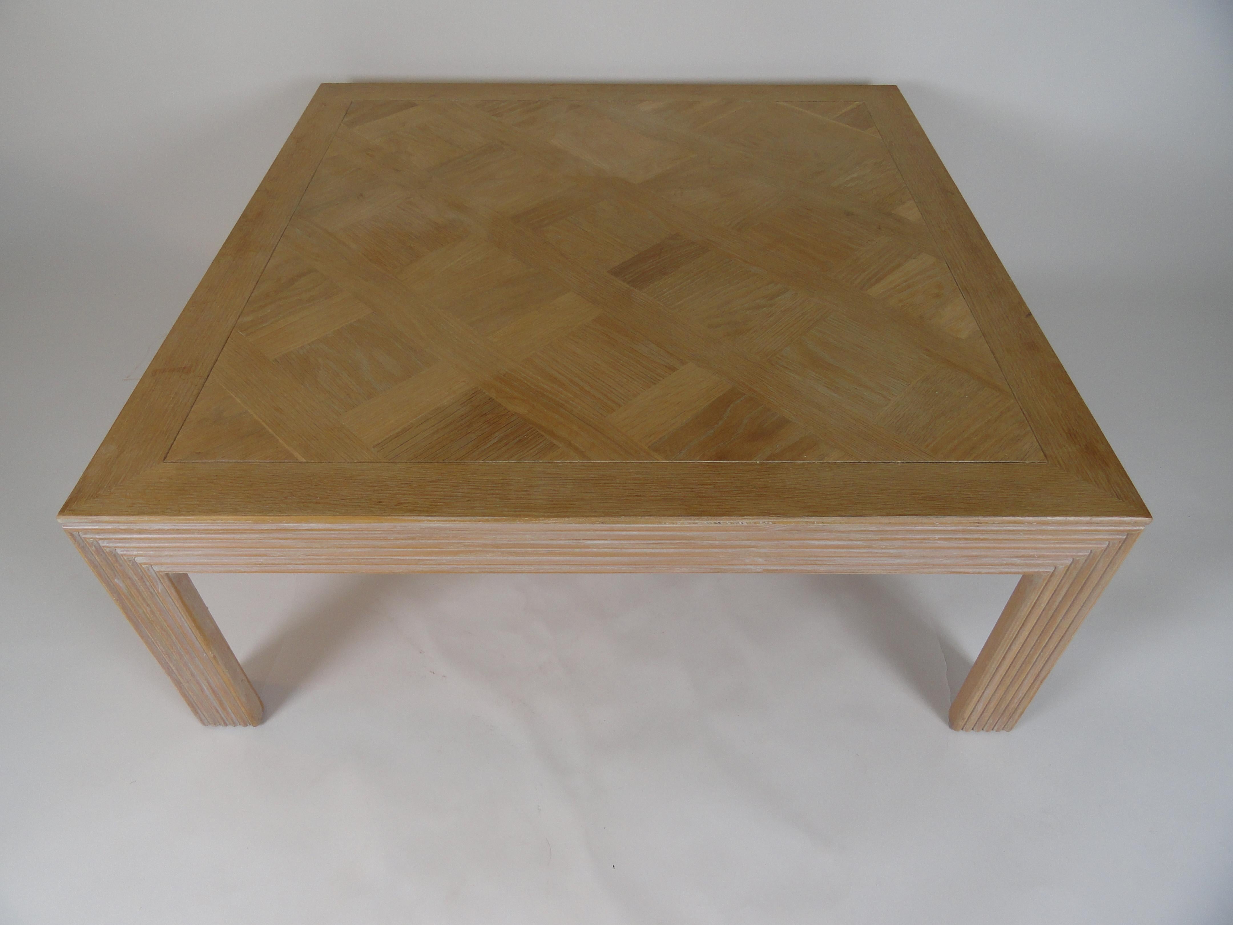 Square Lane Furniture inlaid bleached wood coffee table with fluted wood leg detail.
Stamped on bottom. Bleached top shows slight variations in finish across the piece.
