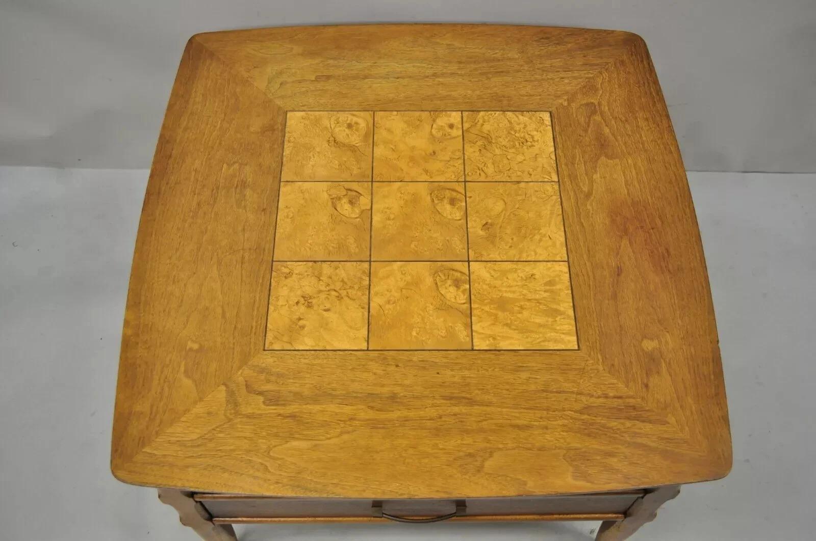 Lane Mid Century Modern Walnut 2 Drawer Lamp End Table with Burlwood Inlay Top. Item features carved and tapered legs, finished back, original stamp, 2 dovetailed drawers, great style and form. Circa Mid 20th Century. Measurements: 20