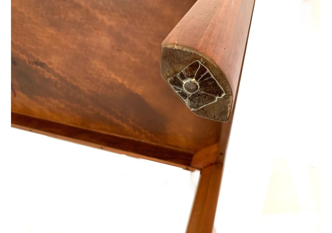 Rectangular walnut cocktail table with cross banding and oak dots. The table resting upon triangular faceted legs. Table is branded Lane and numbered as shown.

Dimensions: 54