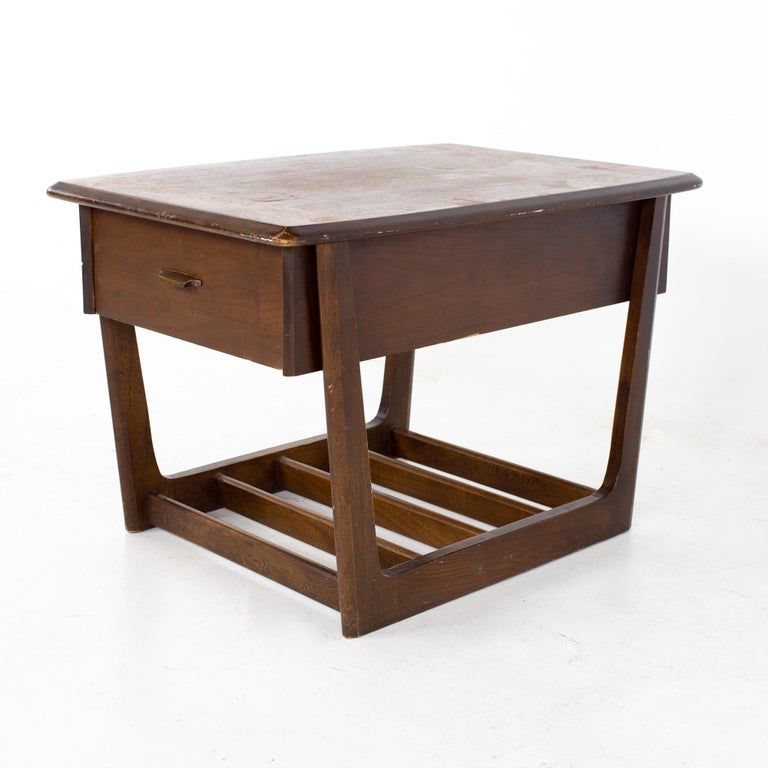 Lane mid century walnut sleigh leg side end table
End table measures: 30.5 wide x 22 deep x 20.5 inches high

All pieces of furniture can be had in what we call restored vintage condition. That means the piece is restored upon purchase so it’s