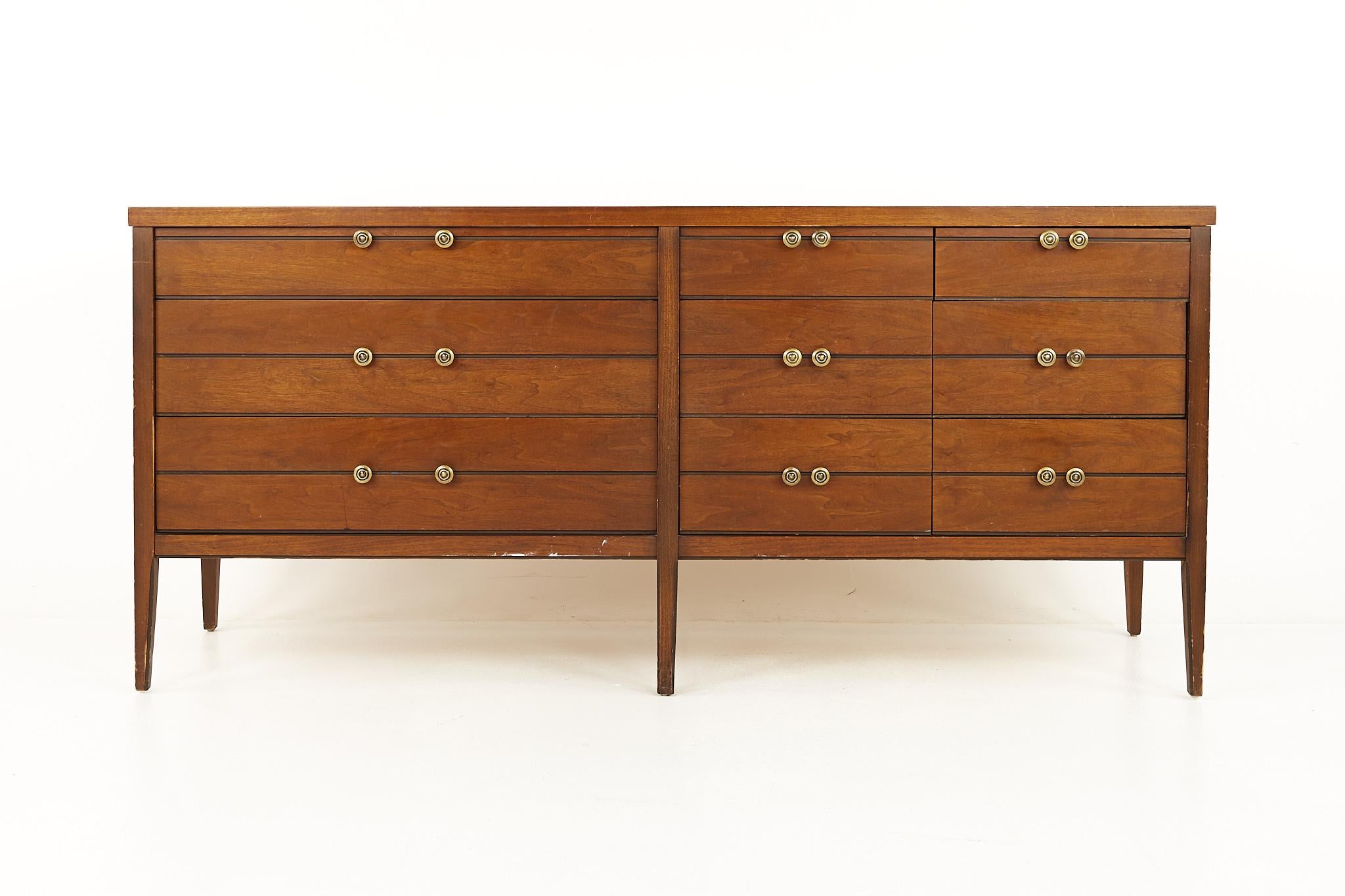 Lane Mid century walnut tuxedo bow tie sideboard credenza

This credenza measures: 66.25 wide x 18.25 deep x 30.25 inches high

All pieces of furniture can be had in what we call restored vintage condition. That means the piece is restored upon
