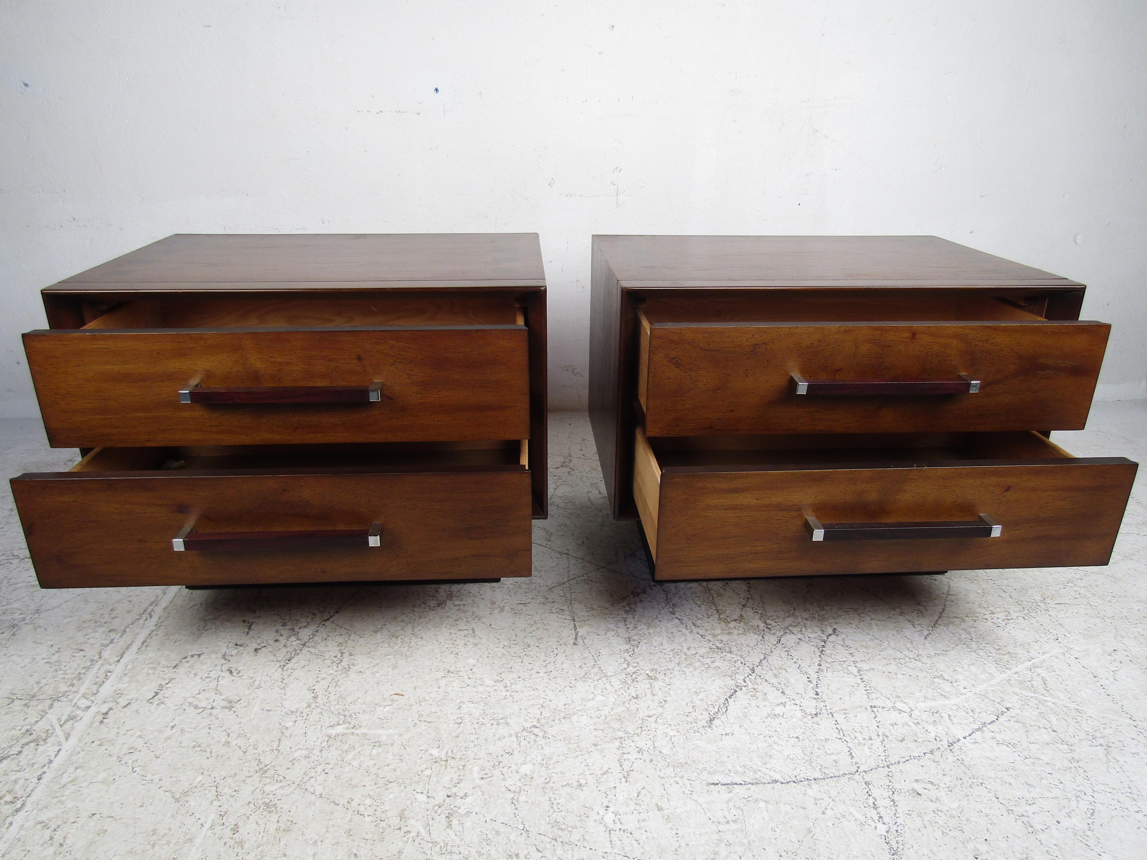 Beautiful vintage modern nightstands by Lane A lovely two-tone design with a walnut casing and rosewood accents/inlays. The unique rosewood and chrome drawer handles, vertical louvered cabinet doors and dovetailed construction on the drawers show