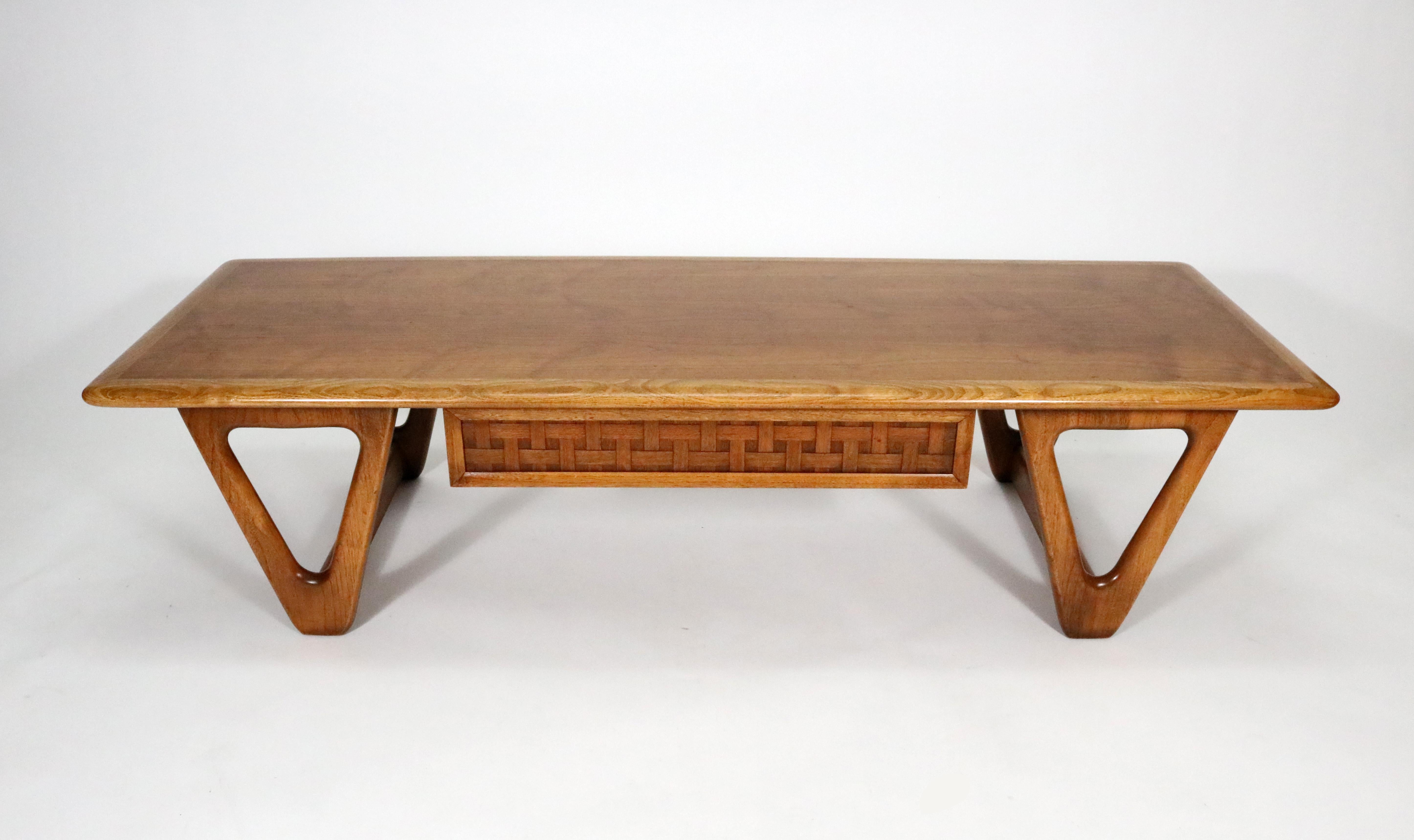 'Perception' walnut coffee table with lattice-front drawer and triangle legs by Warren Church for Lane.