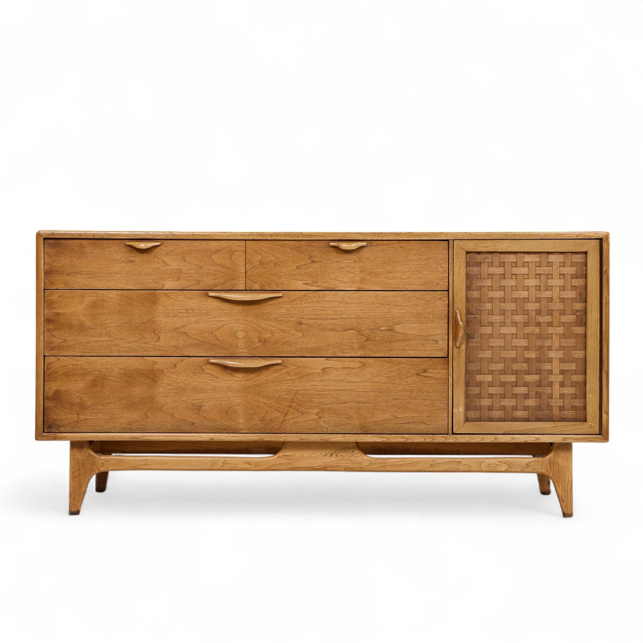 Lane Perception Mid Century Walnut Offset Credenza

This credenza measures: 60 wide x 19 deep x 30 inches high

Fair Vintage Condition - Credenza Finish is Very Faded. Minor Scratches and Wear Throughout. Credenza is Structurally Solid.

We take our
