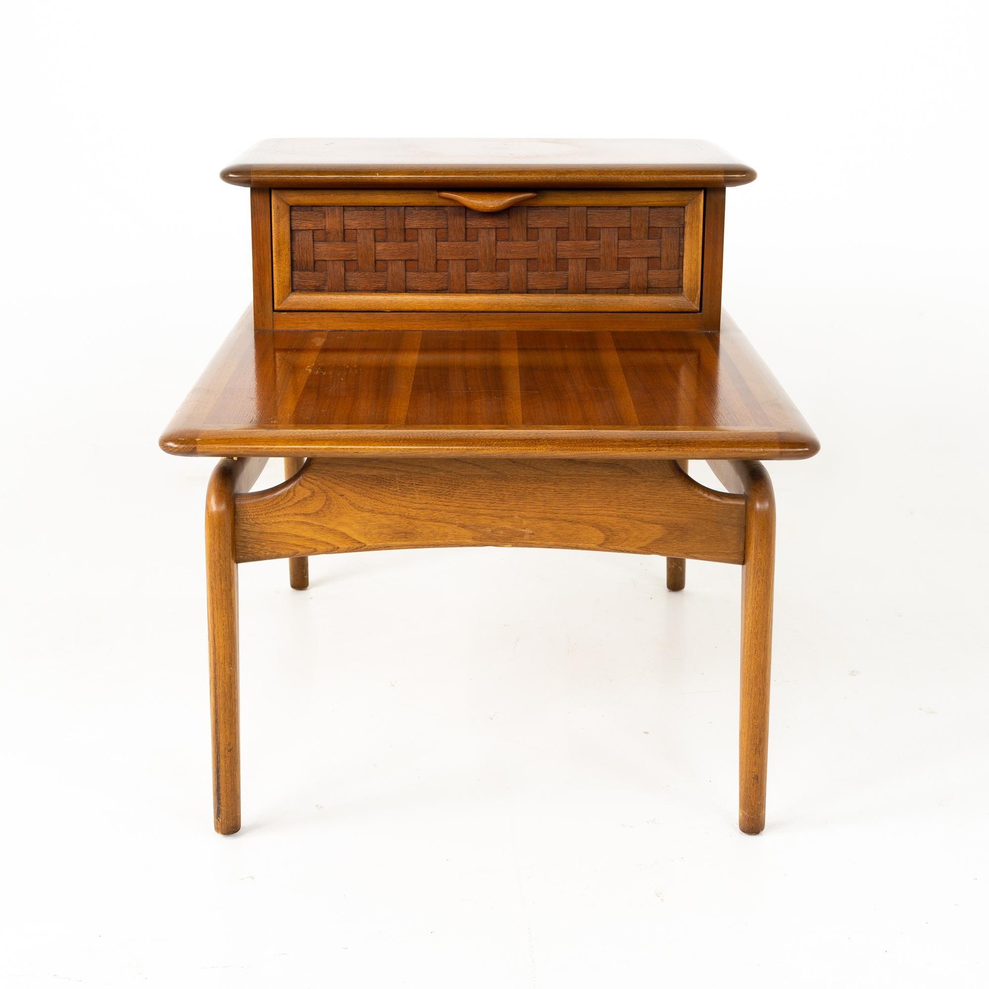 Lane Perception Mid Century Walnut Step Side Table
This table is 22.5 wide x 30 deep x 22 inches high

This price includes getting this piece in what we call Restored Vintage Condition. That means the piece is permanently fixed upon purchase so it’s