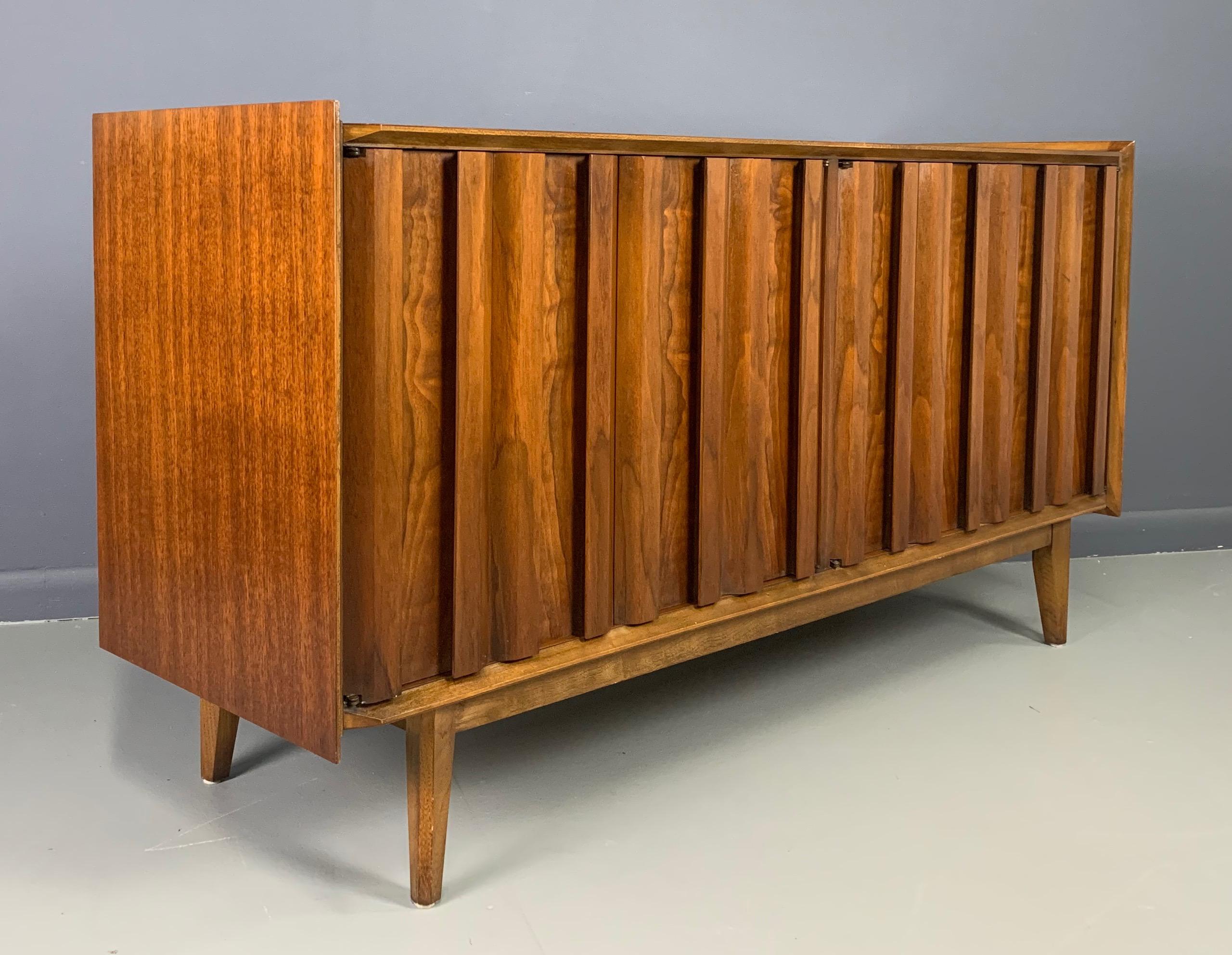 An early Lane walnut credenza, small in stature but big on looks! This piece would make a great addition to any NYC apartment.