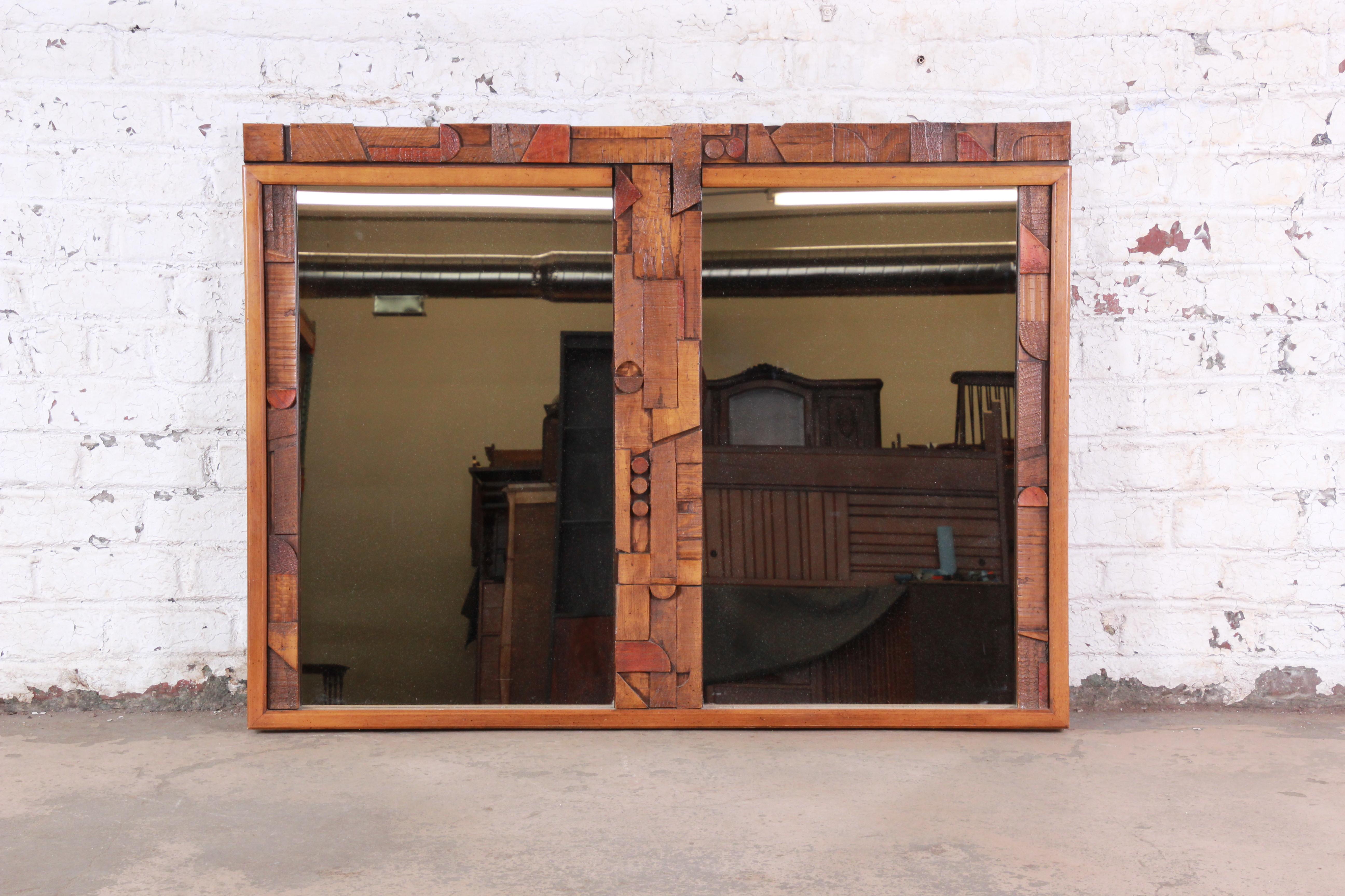 Pueblo Mid-Century Modern Brutalist double mirror

Made by Lane Furniture Co.

USA, 1970s

Mirror and oak

Measures: 55